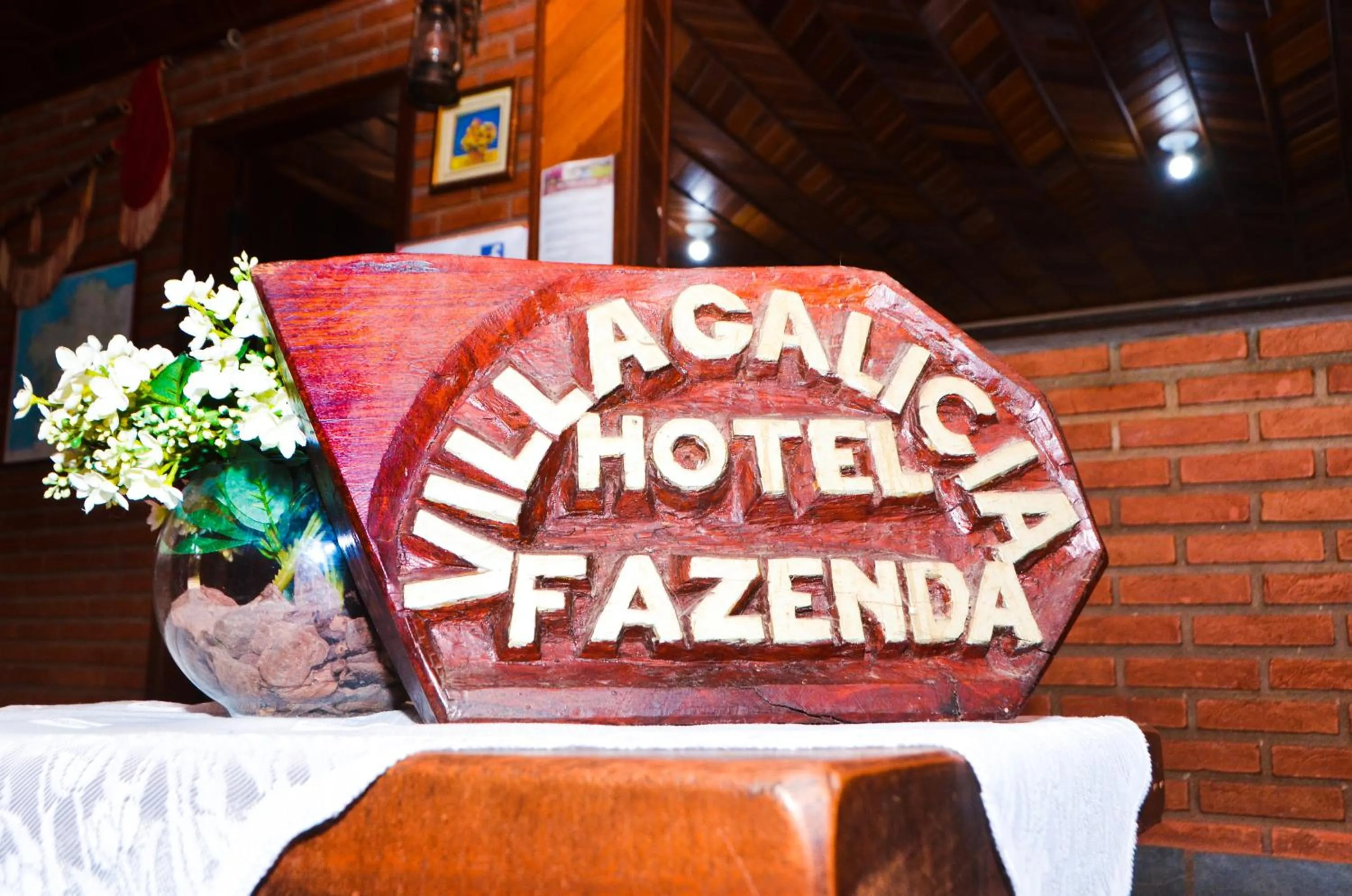 Property logo or sign in Hotel Fazenda Villa Galicia