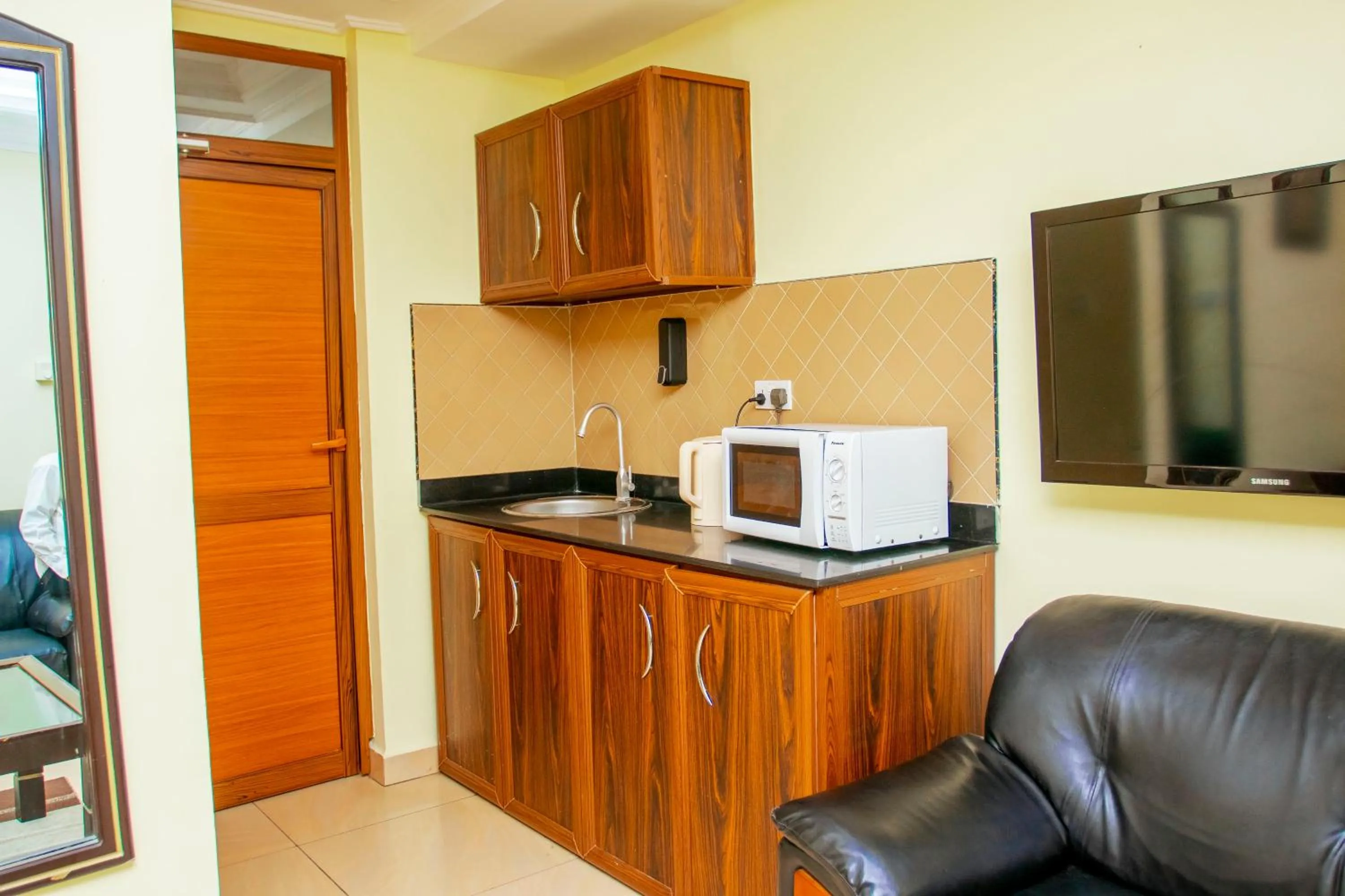 TV and multimedia in Sleep Inn Hotel - Kariakoo