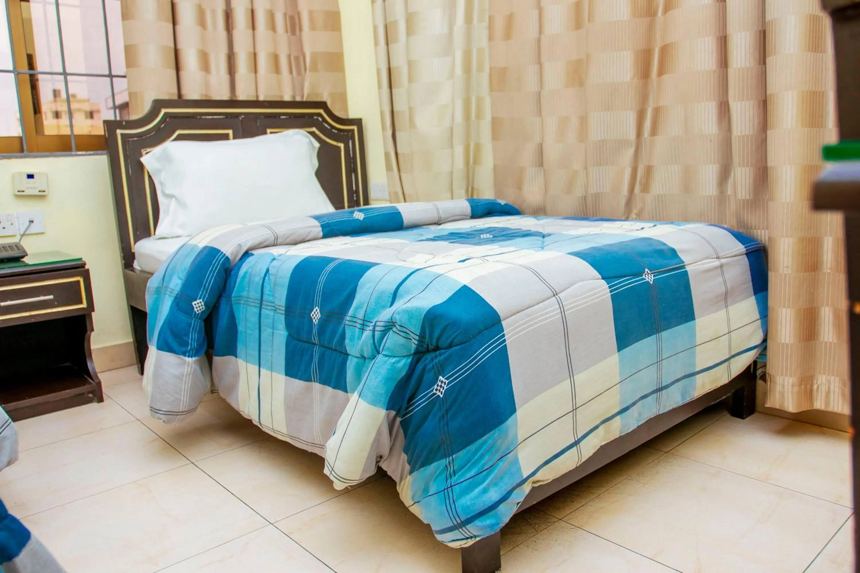 Bed in Sleep Inn Hotel - Kariakoo