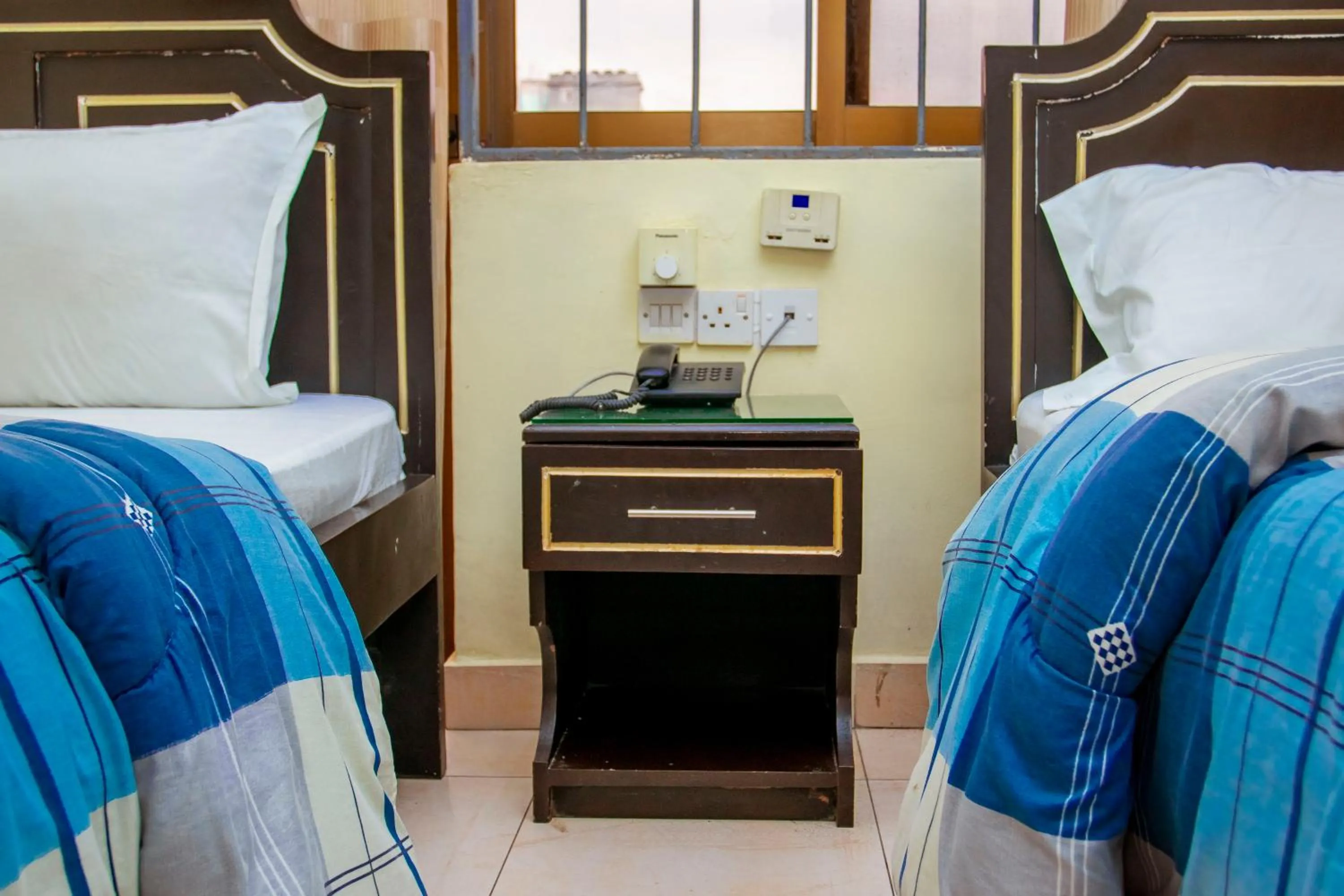 Bed in Sleep Inn Hotel - Kariakoo