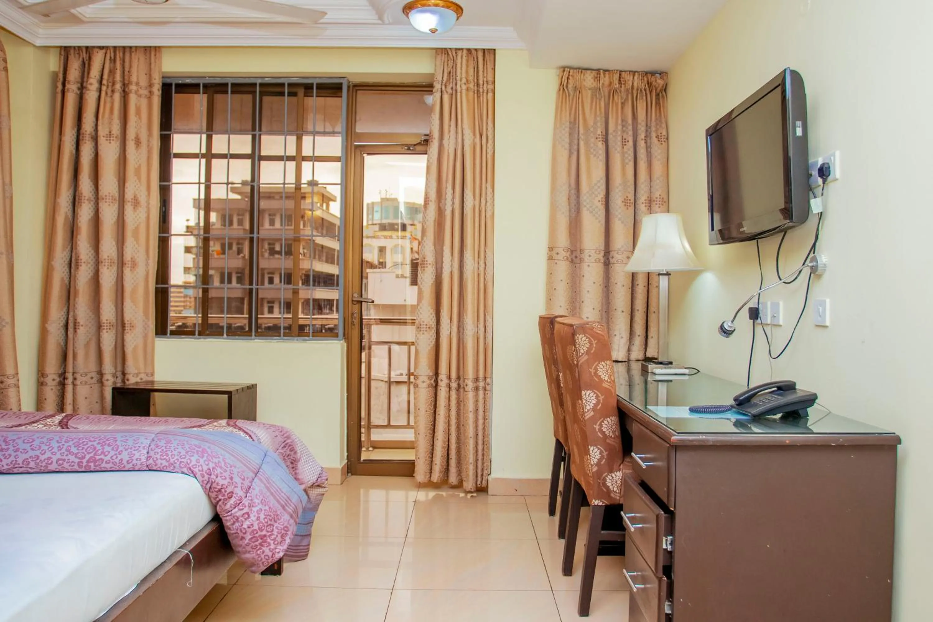 Bed in Sleep Inn Hotel - Kariakoo