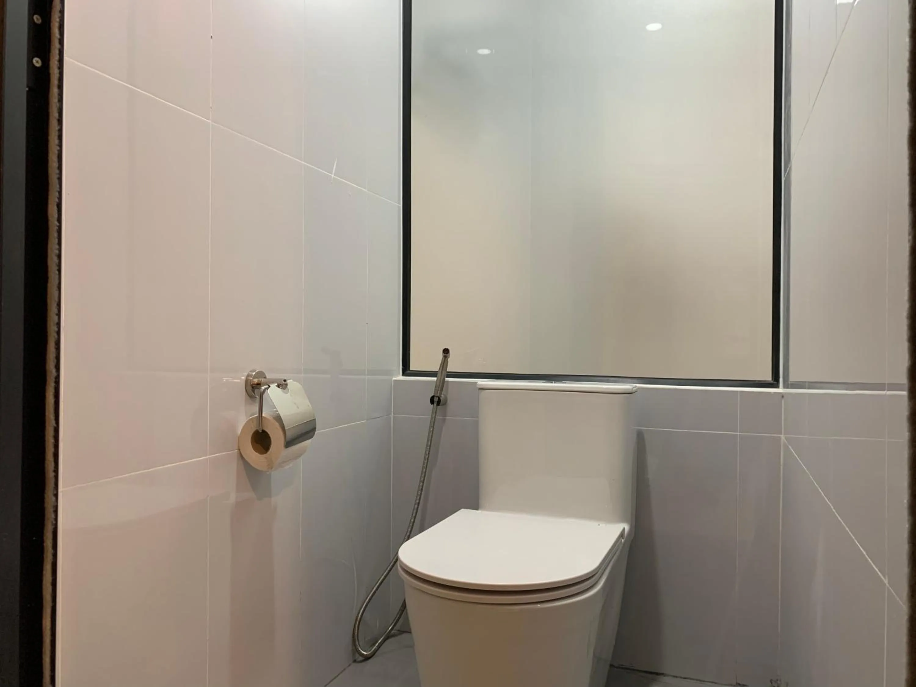 Toilet in Nico’s Hotel and SkyBar