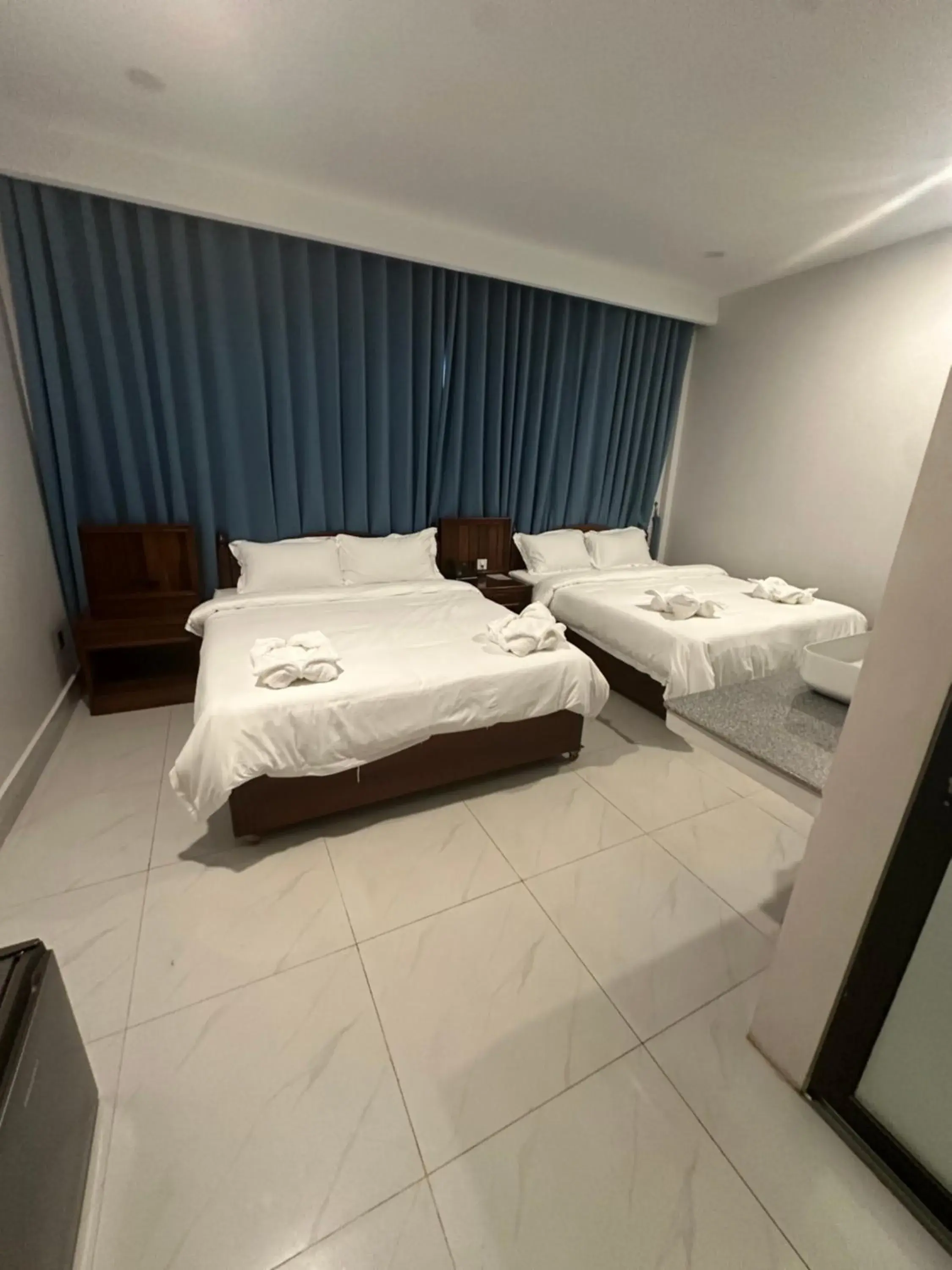 Bed in Nico’s Hotel and SkyBar Bed in Nico’s Hotel and SkyBar