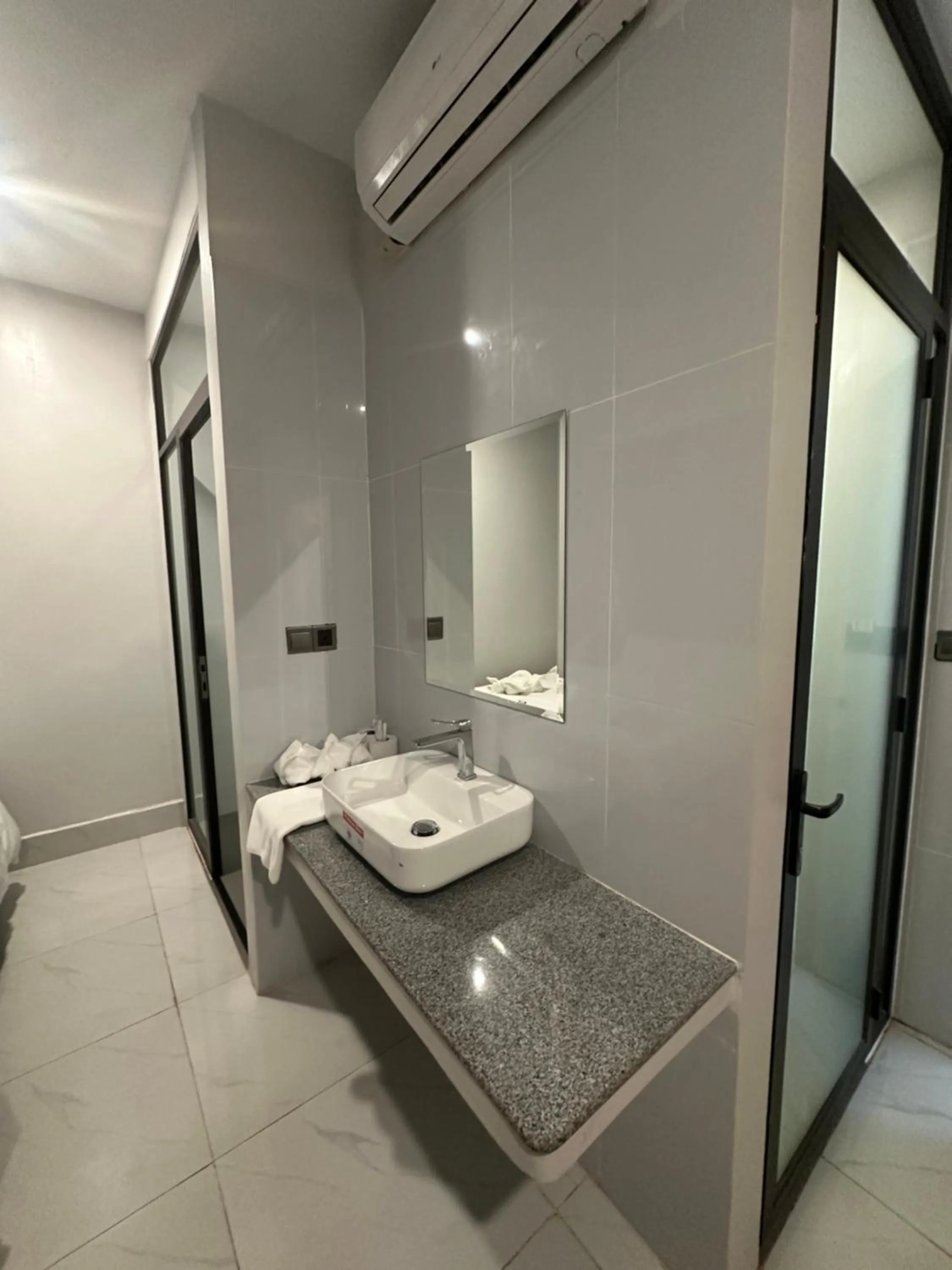 Bathroom in Nico’s Hotel and SkyBar