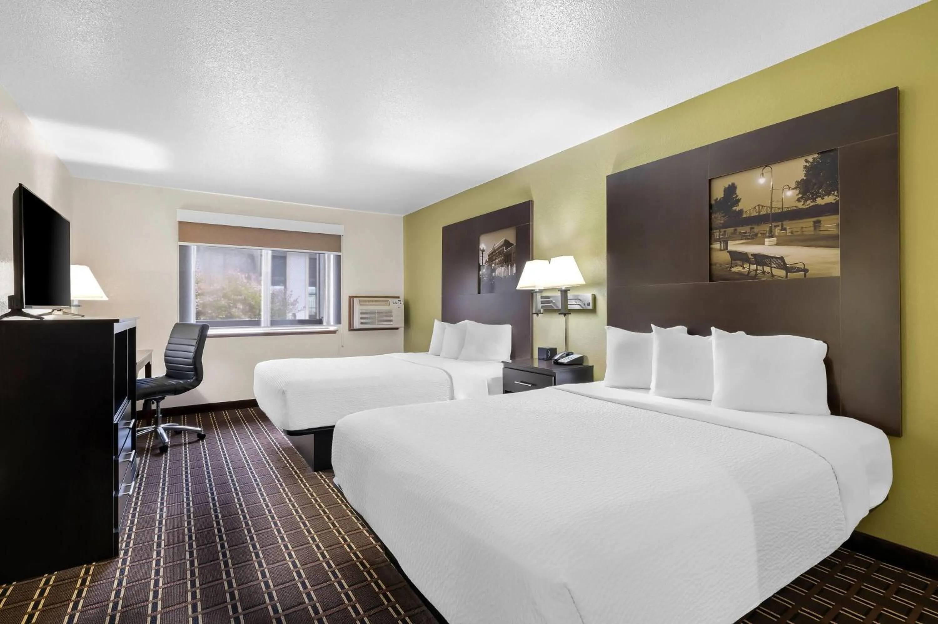Bed in Super 8 by Wyndham La Crosse