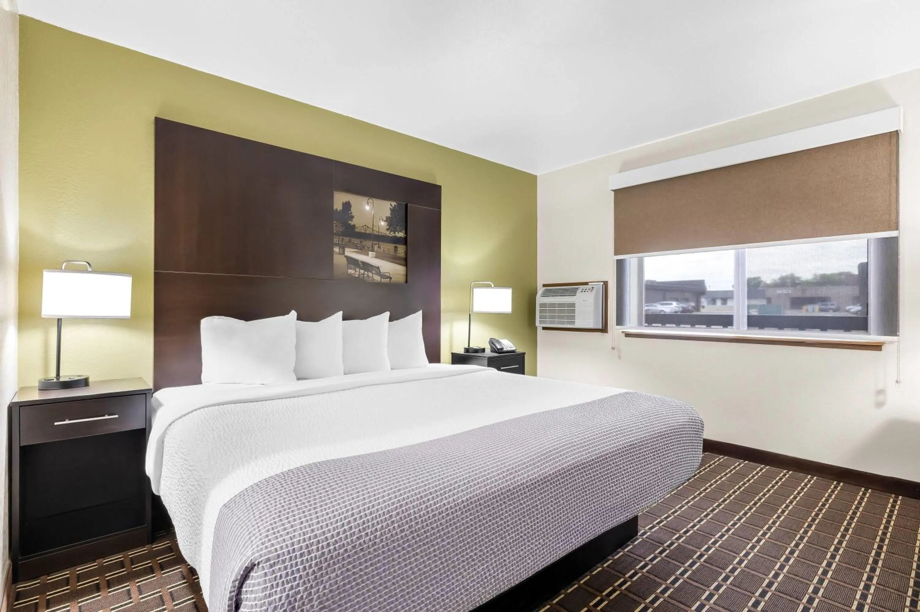 Bed in Super 8 by Wyndham La Crosse