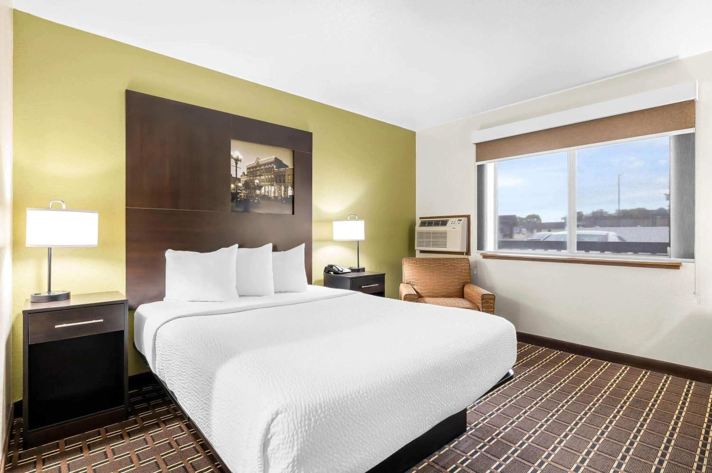 Bed in Super 8 by Wyndham La Crosse