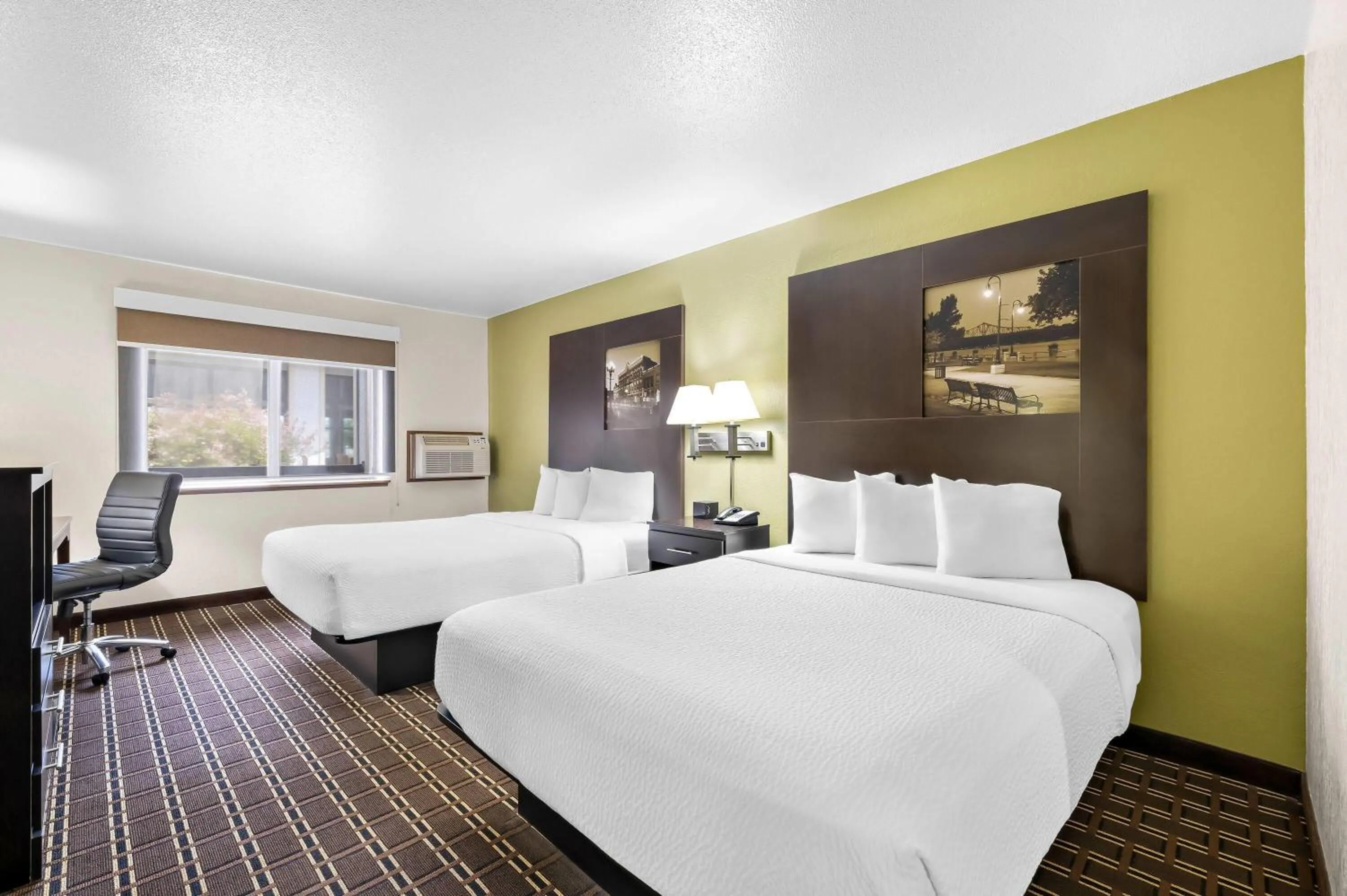 Bed in Super 8 by Wyndham La Crosse