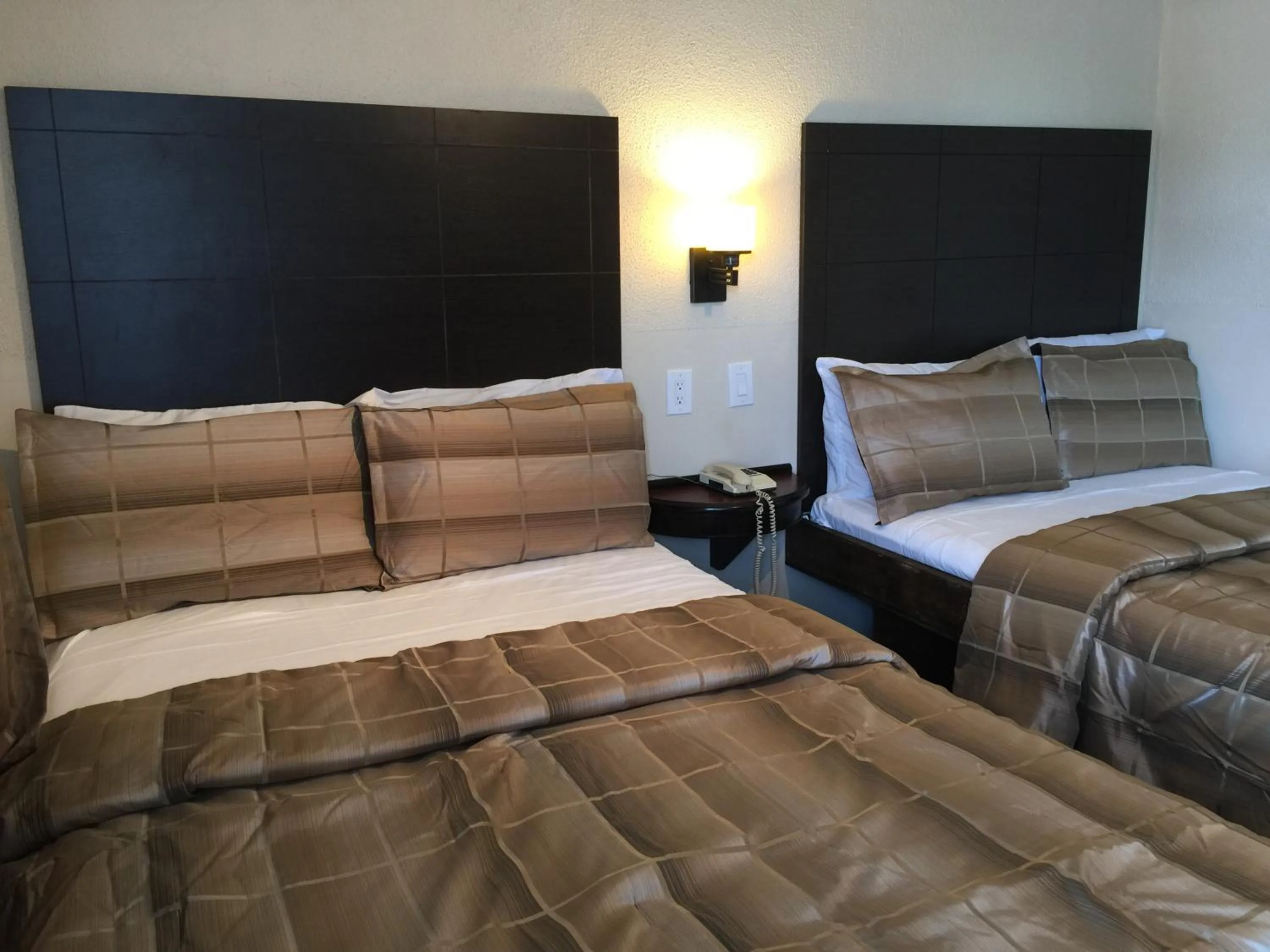 Bed in Mayflower Motel