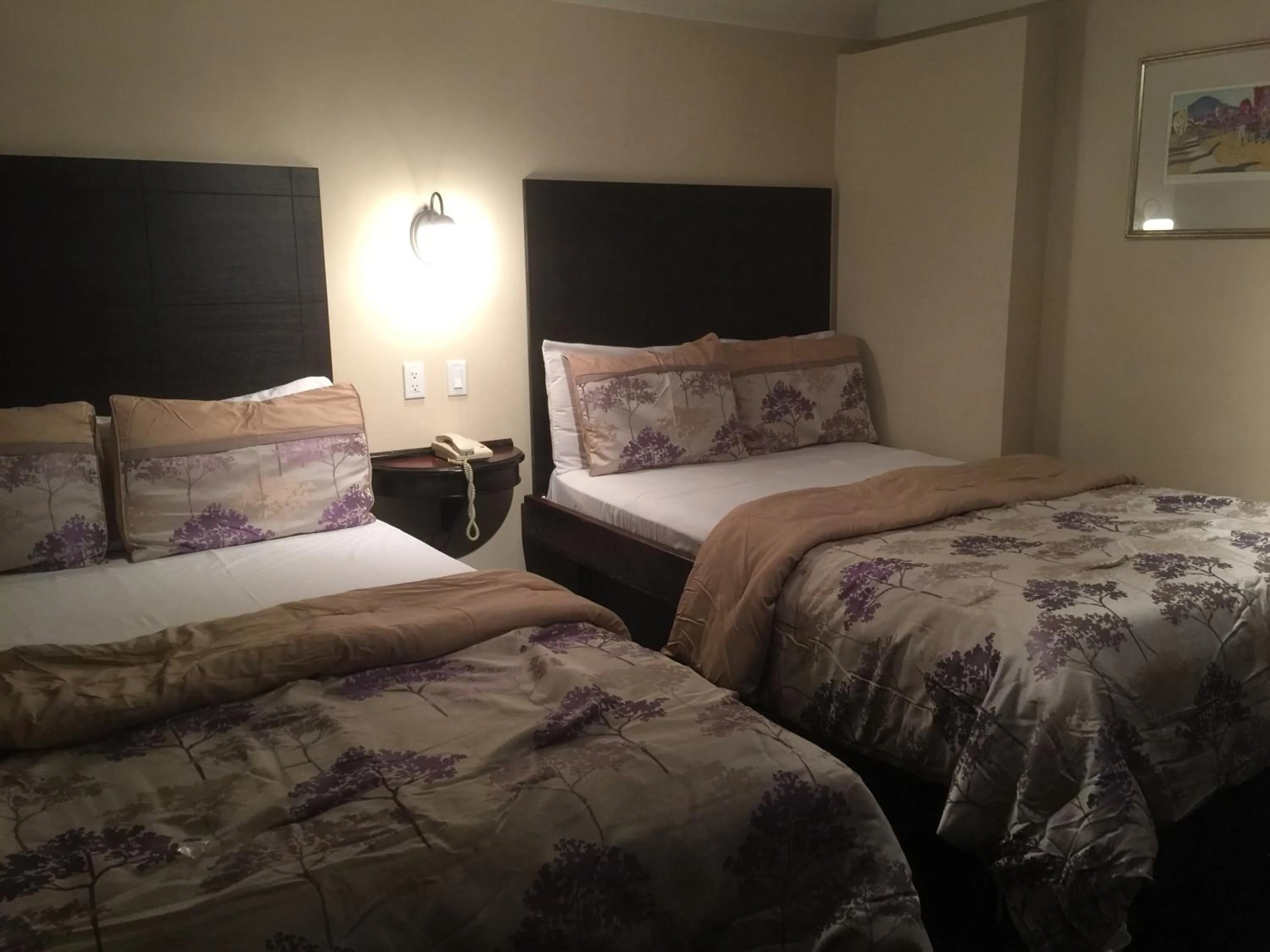 Bed in Mayflower Motel