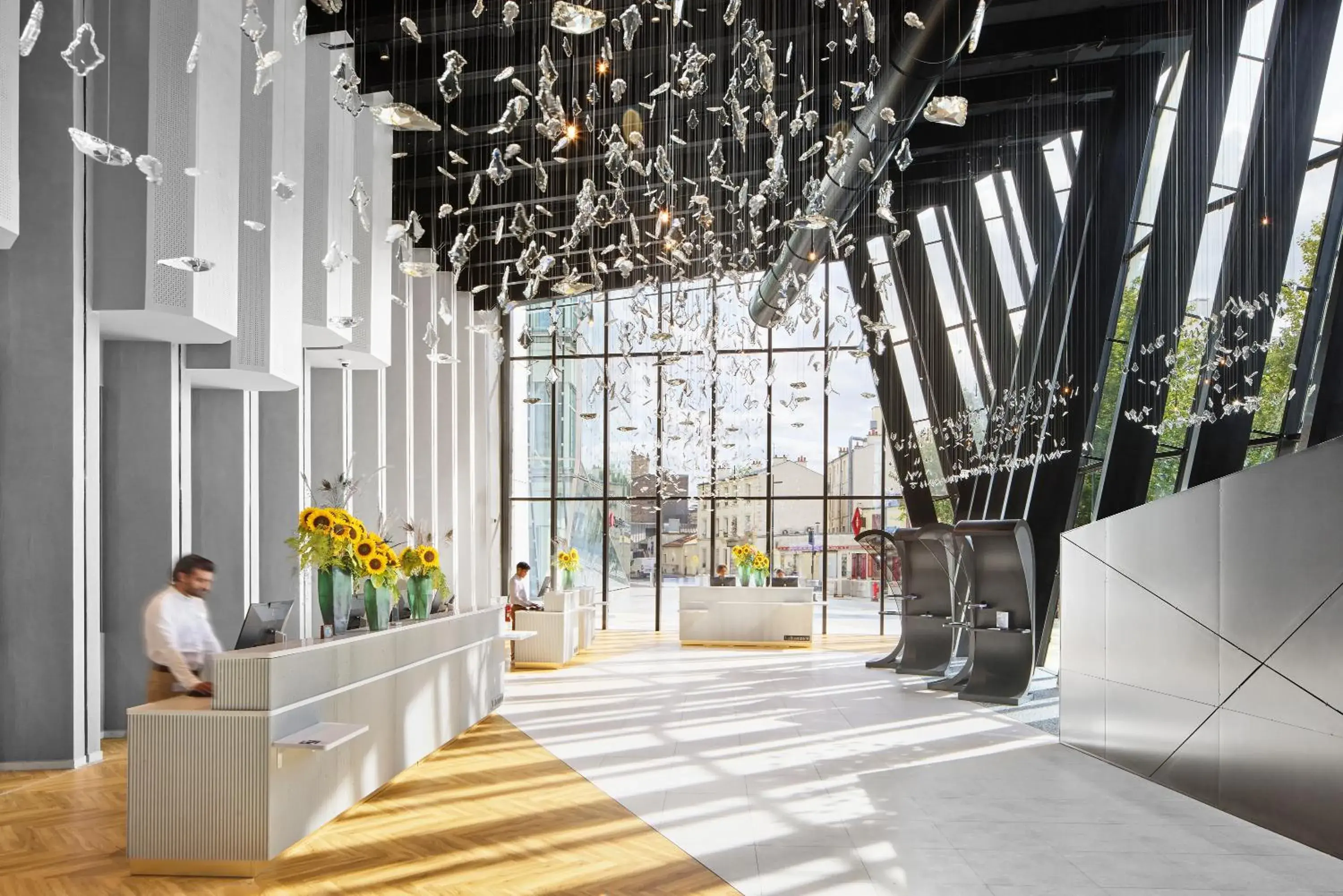 Lobby or reception in H4 Hotel Wyndham Paris Pleyel Resort Lobby or reception in H4 Hotel Wyndham Paris Pleyel Resort