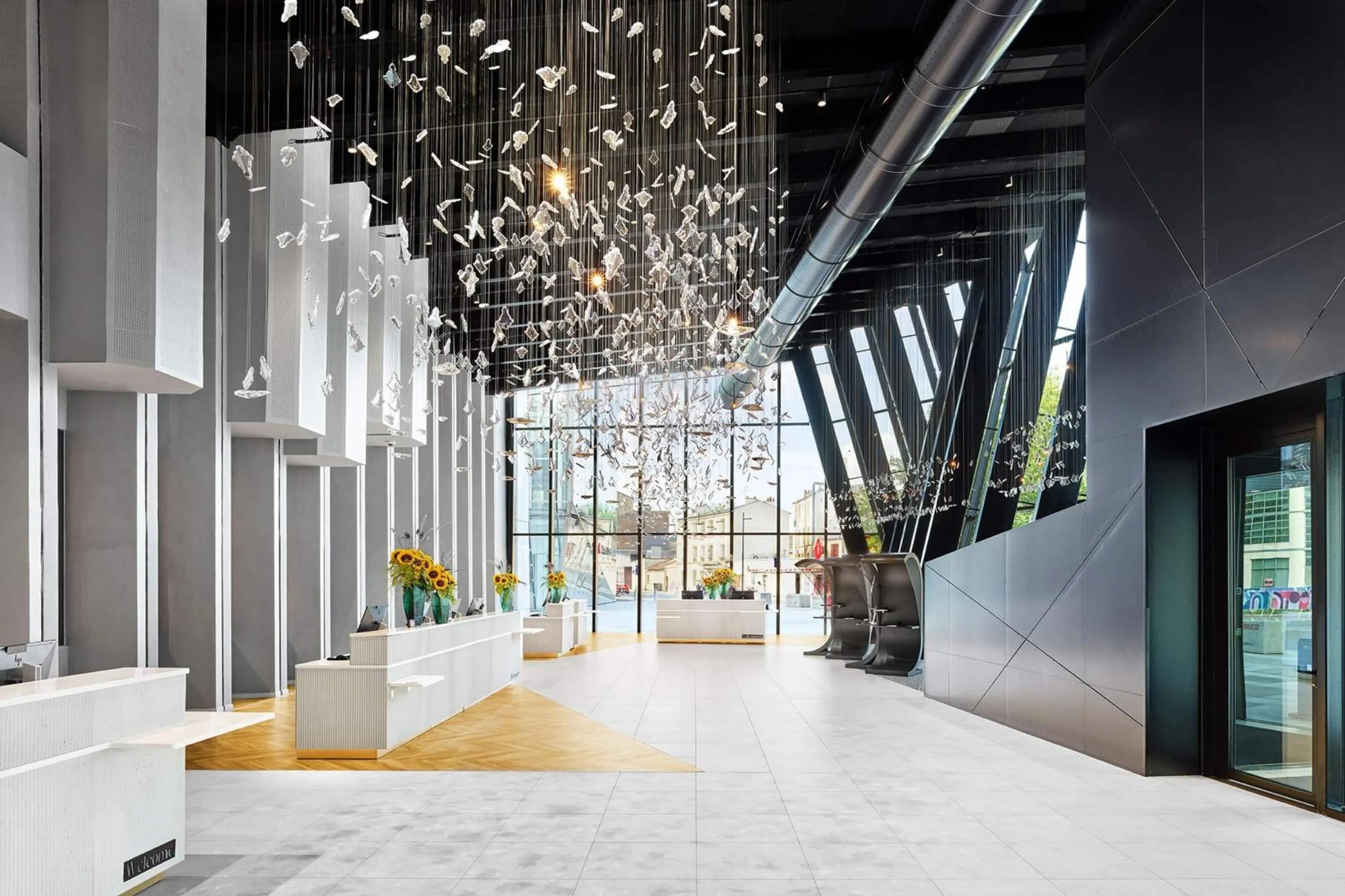 Lobby or reception in H4 Wyndham Paris Pleyel