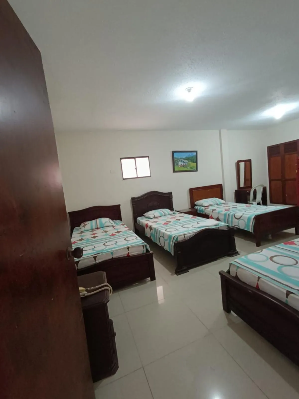 Bed in Hotel Granada Inn