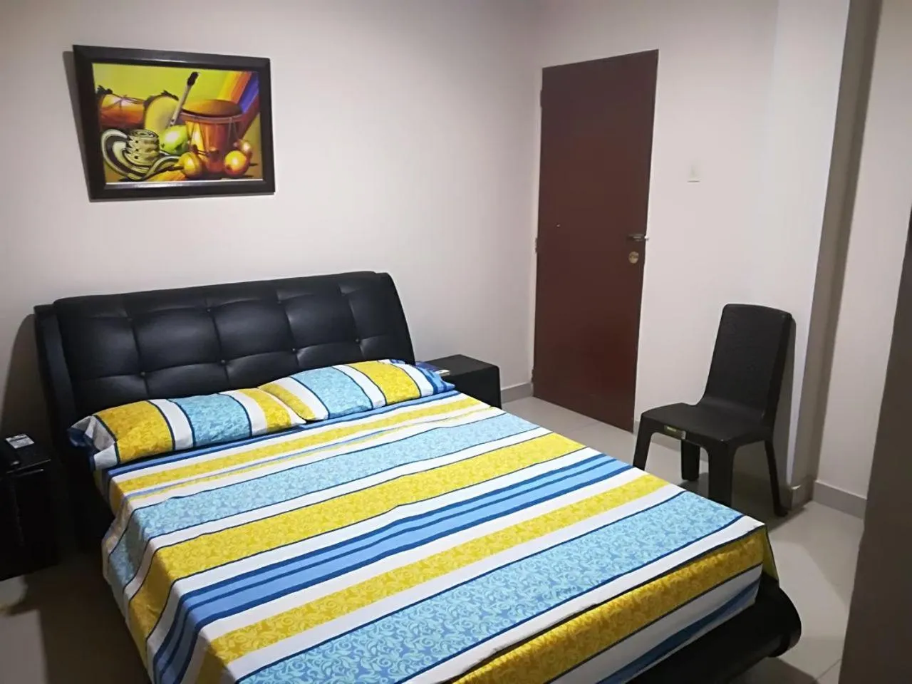 Bed in Hotel Granada Inn