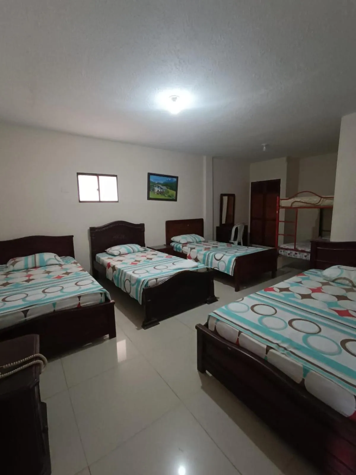 Bed in Hotel Granada Inn