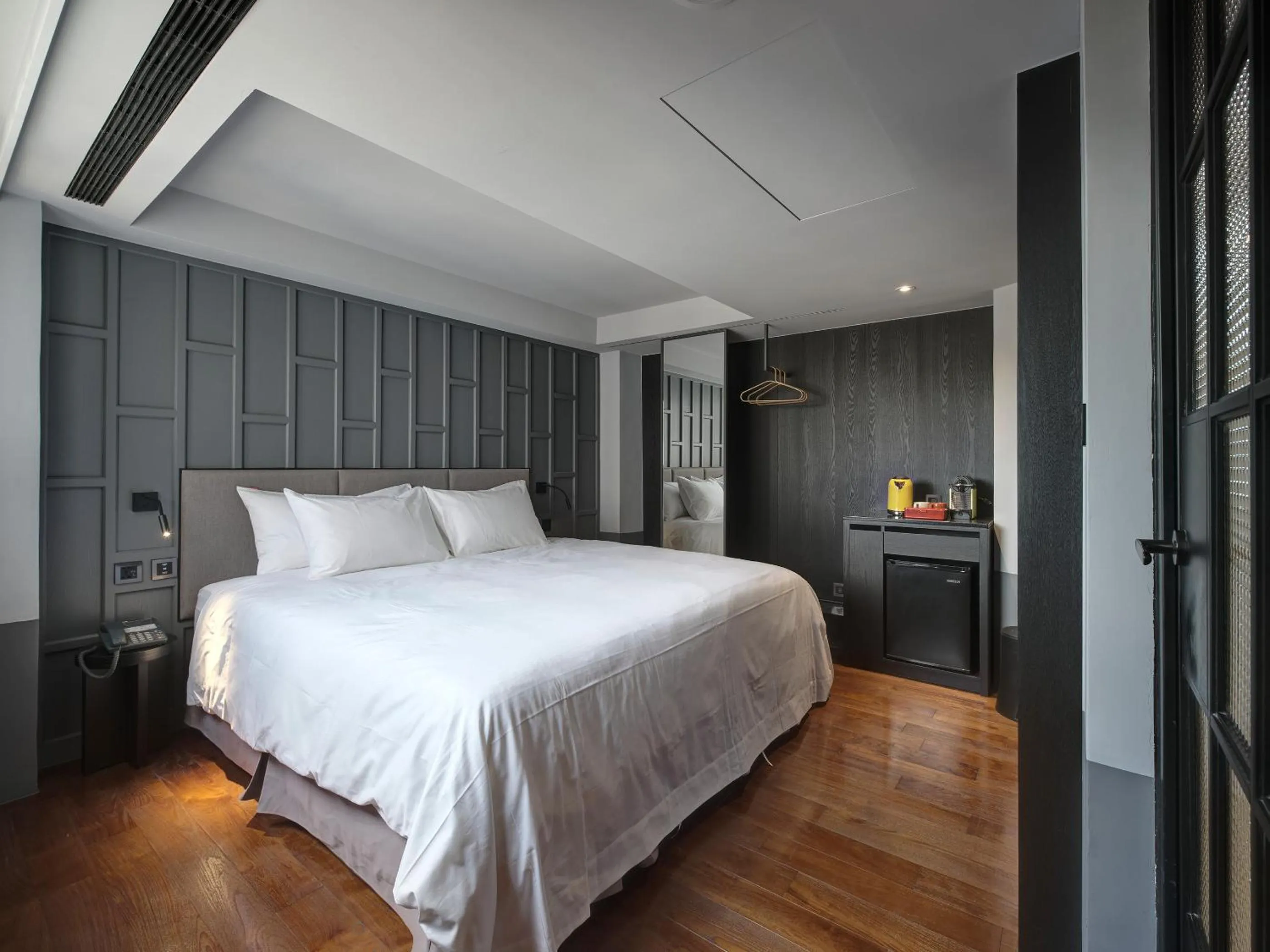 Bed in Reddot Hotel