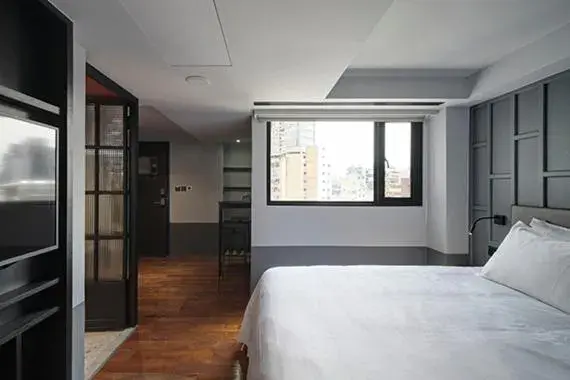 Bed in Reddot Hotel Bed in Reddot Hotel