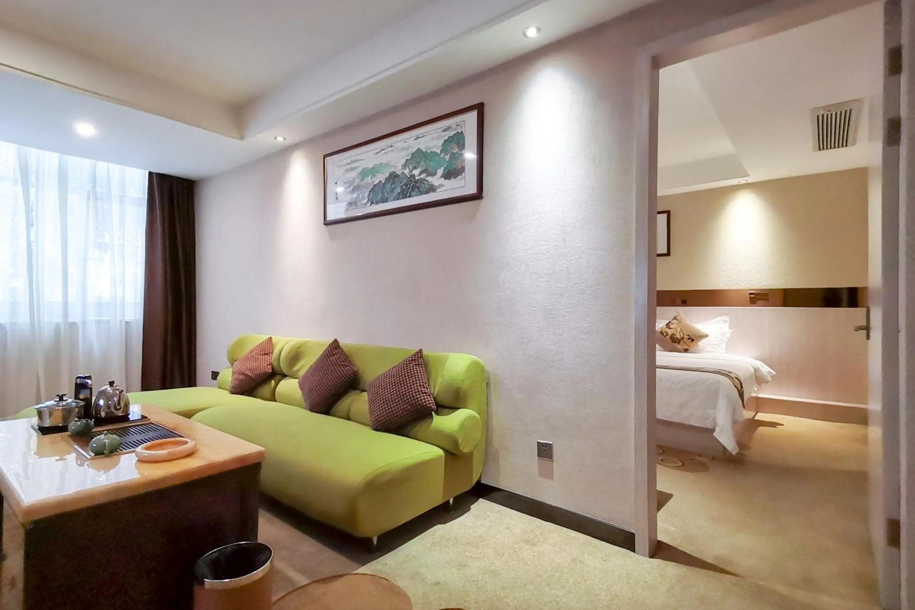 Living room, Bed in Paco Hotel Tianhe Coach Terminal Metro Satation Guangzhou-Free Shuttle Bus for Canton Fair