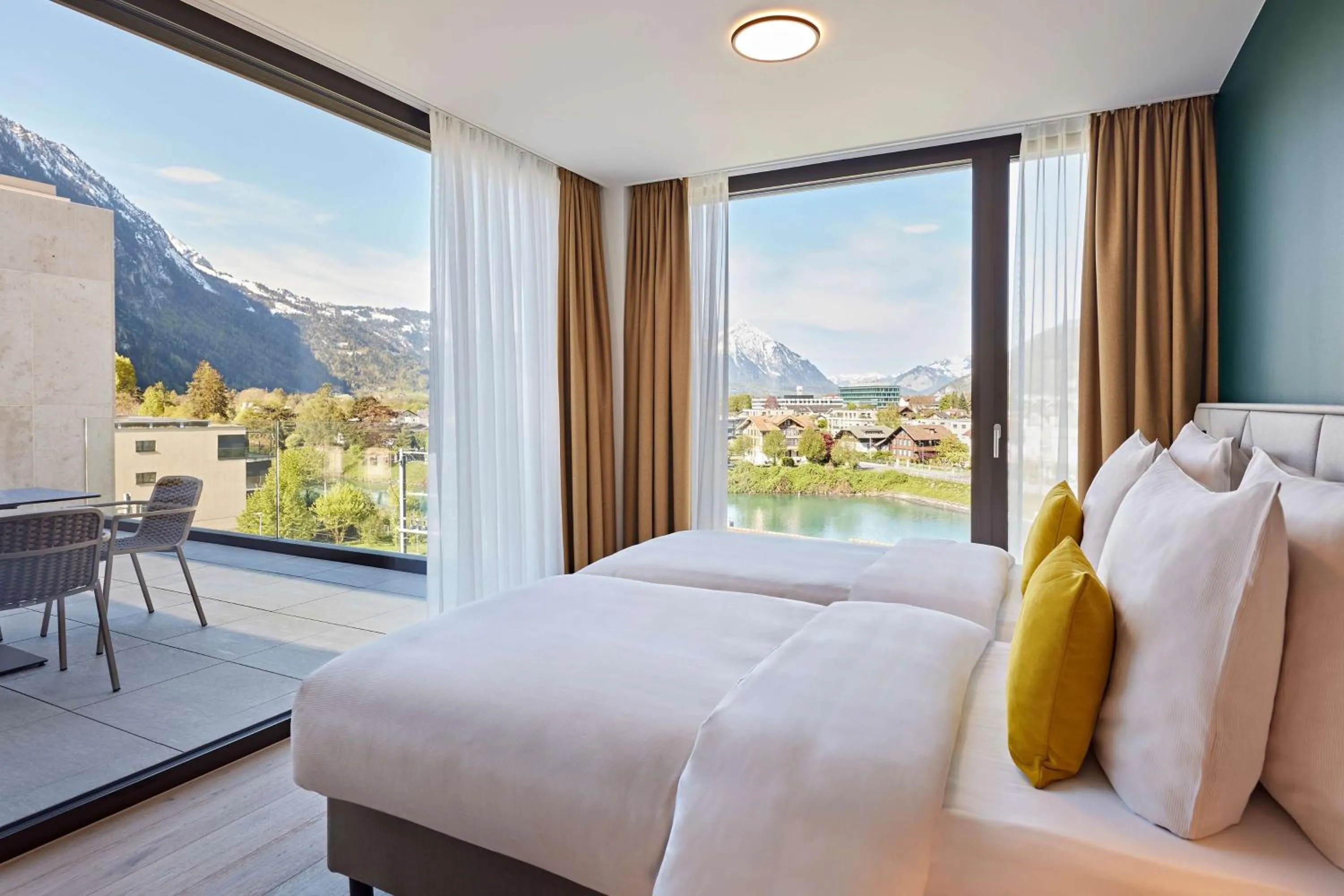 Photo of the whole room, Bed in Essential by Dorint Interlaken - New Opening