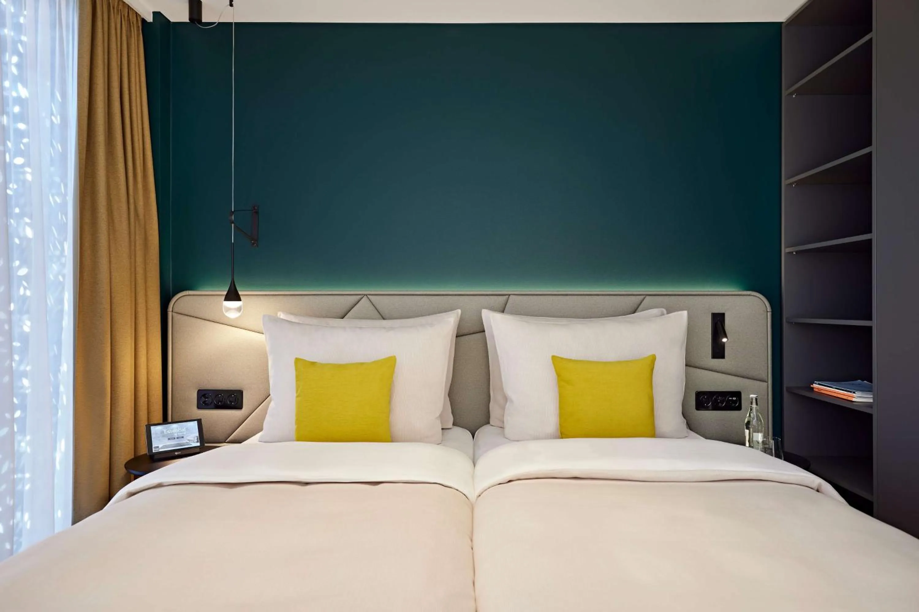 Photo of the whole room, Bed in Essential by Dorint Interlaken - New Opening