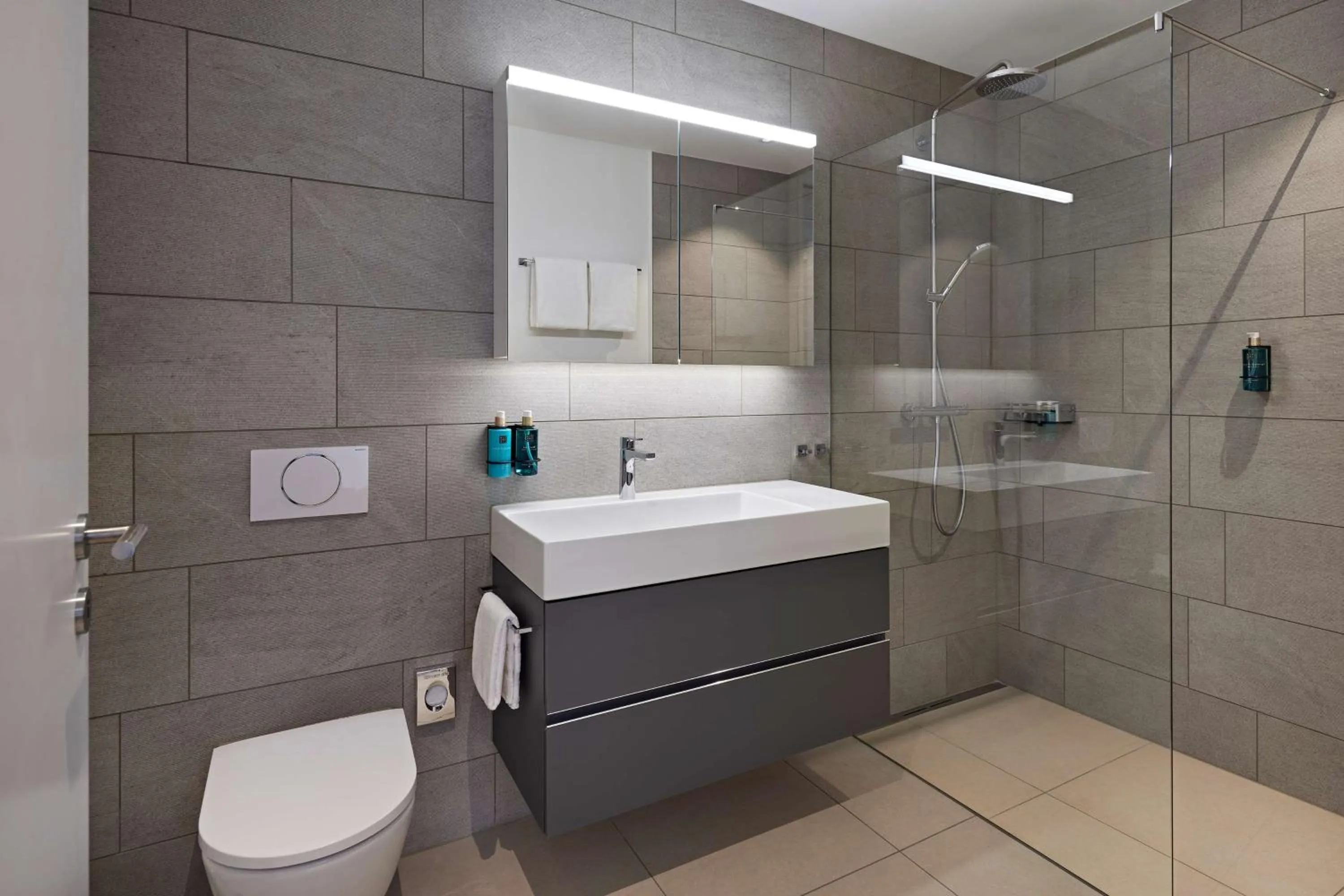 Bathroom in Essential by Dorint Interlaken - New Opening