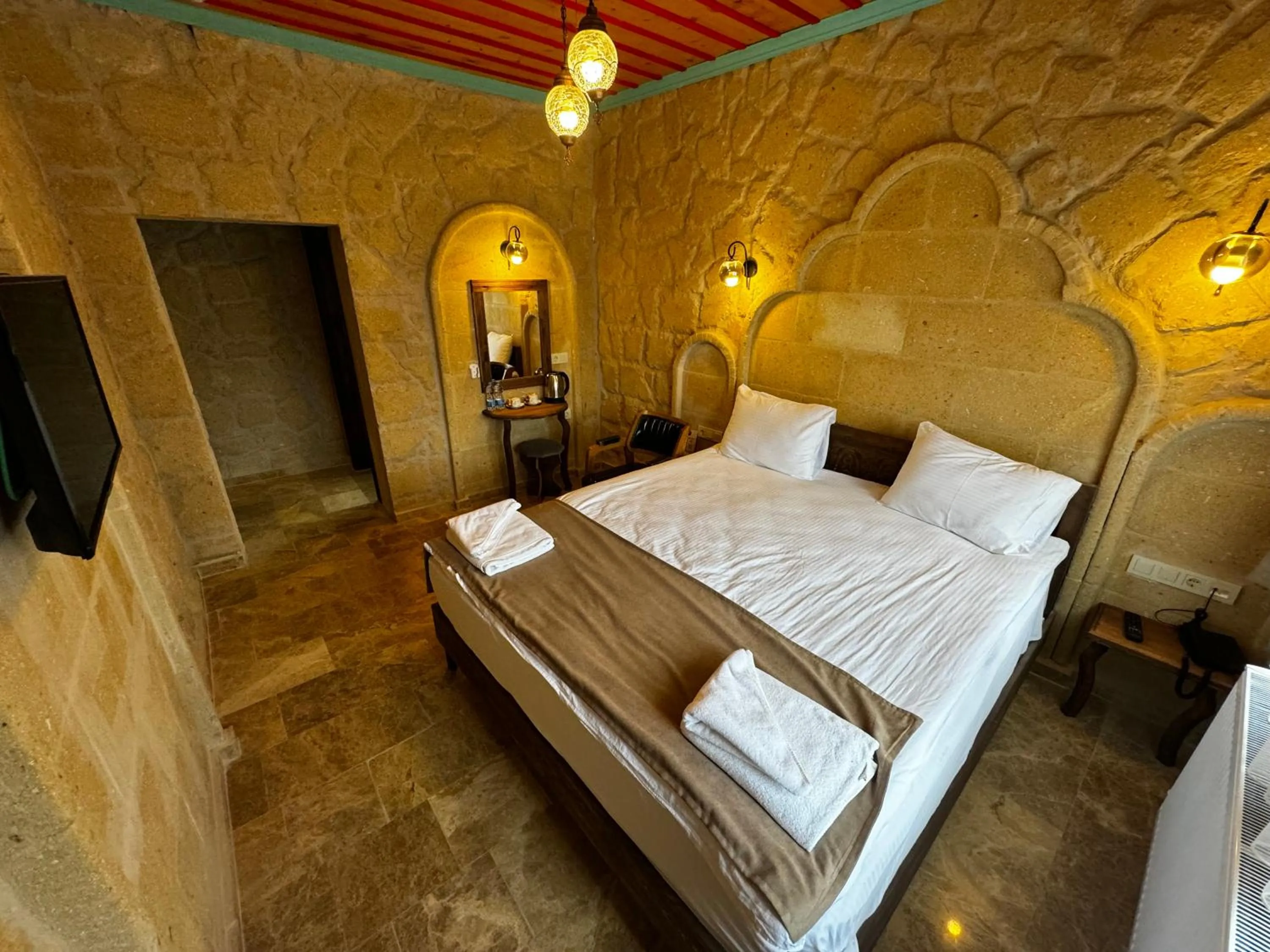 Bed in Rustic Caves