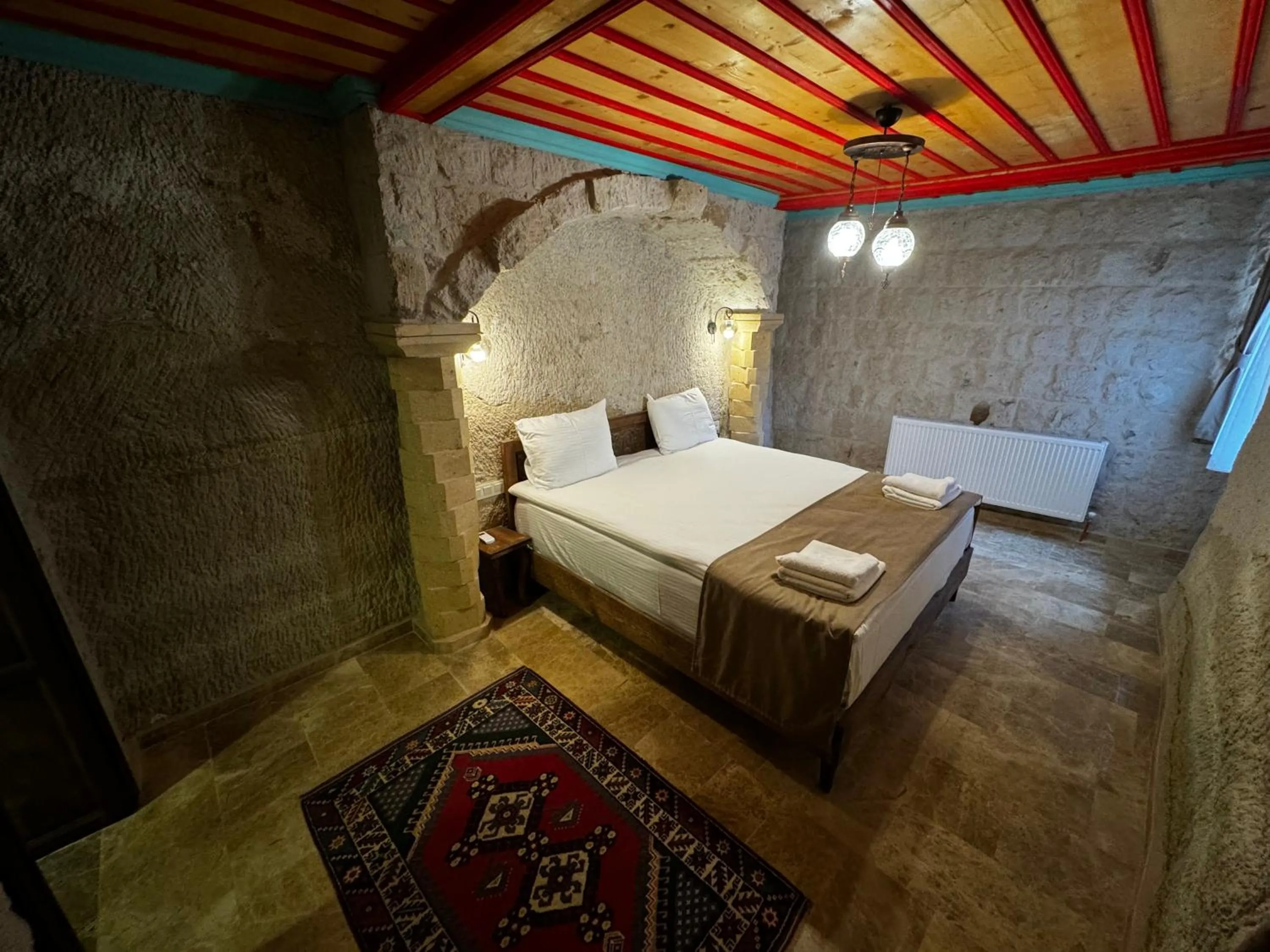 Bed in Rustic Caves