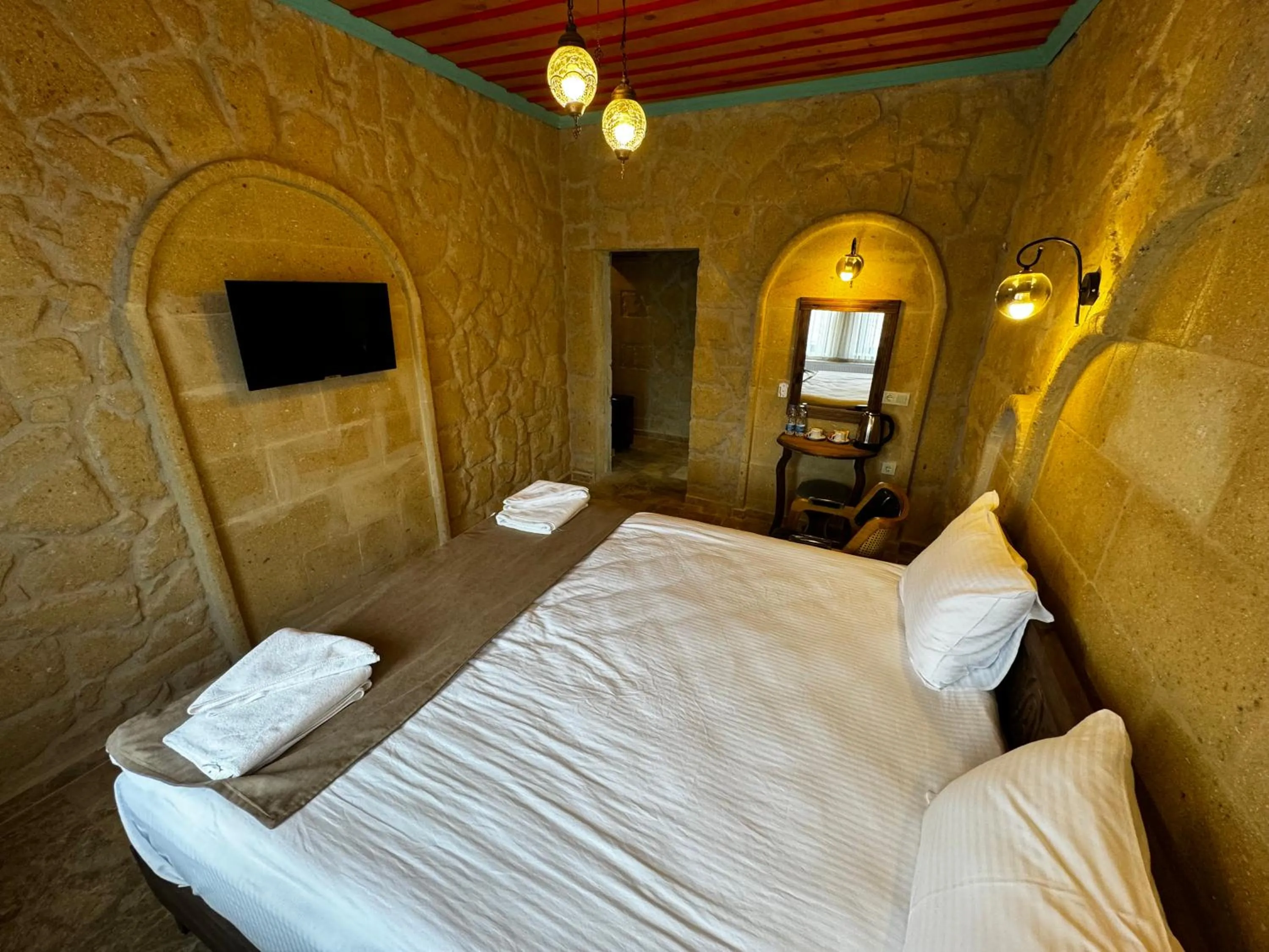 Bed in Rustic Caves