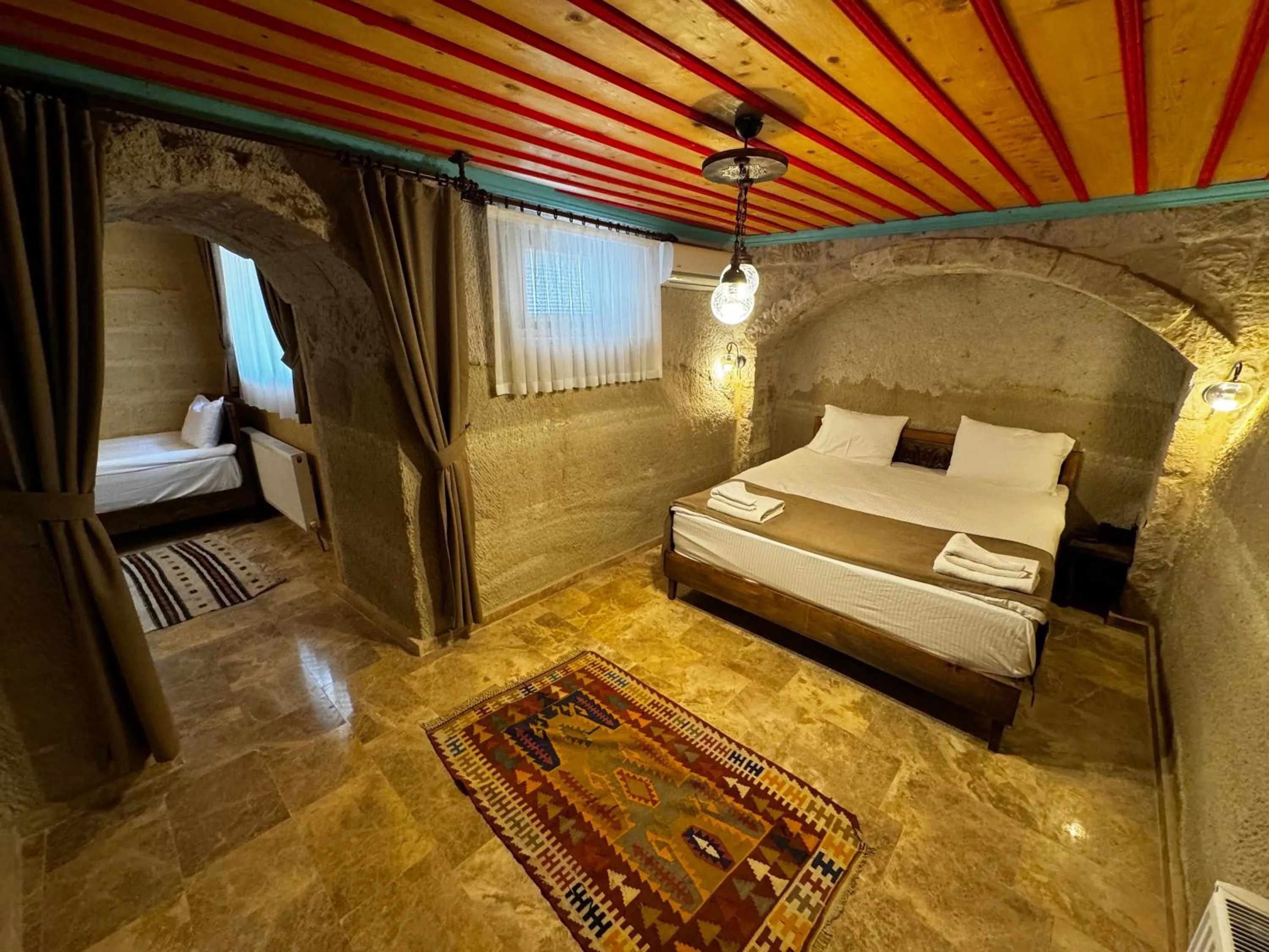 Bed in Rustic Caves