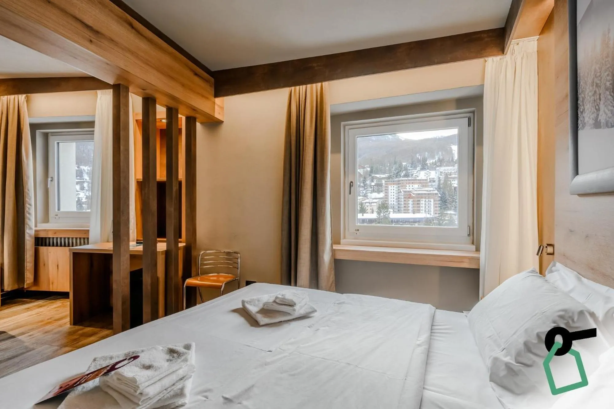 Photo of the whole room, Bed in Hotiday Sauze Torre