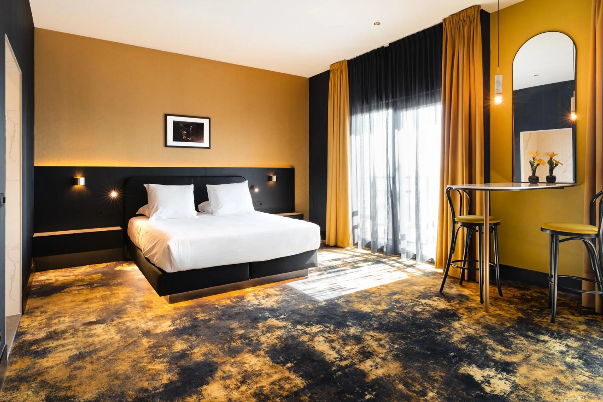 Bed in Van der Valk TheaterHotel De Oranjerie