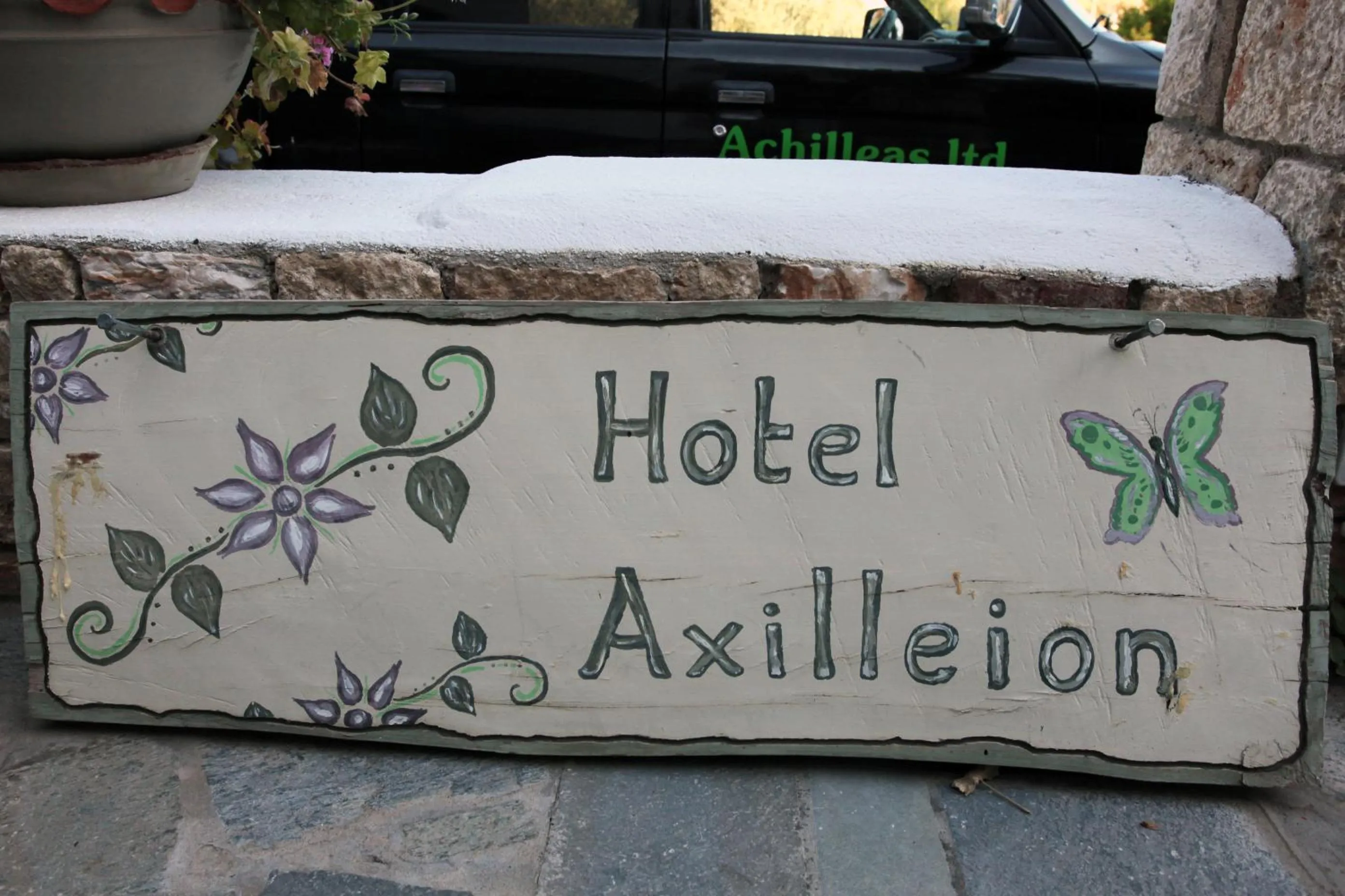 Property logo or sign in Achilleion Hotel