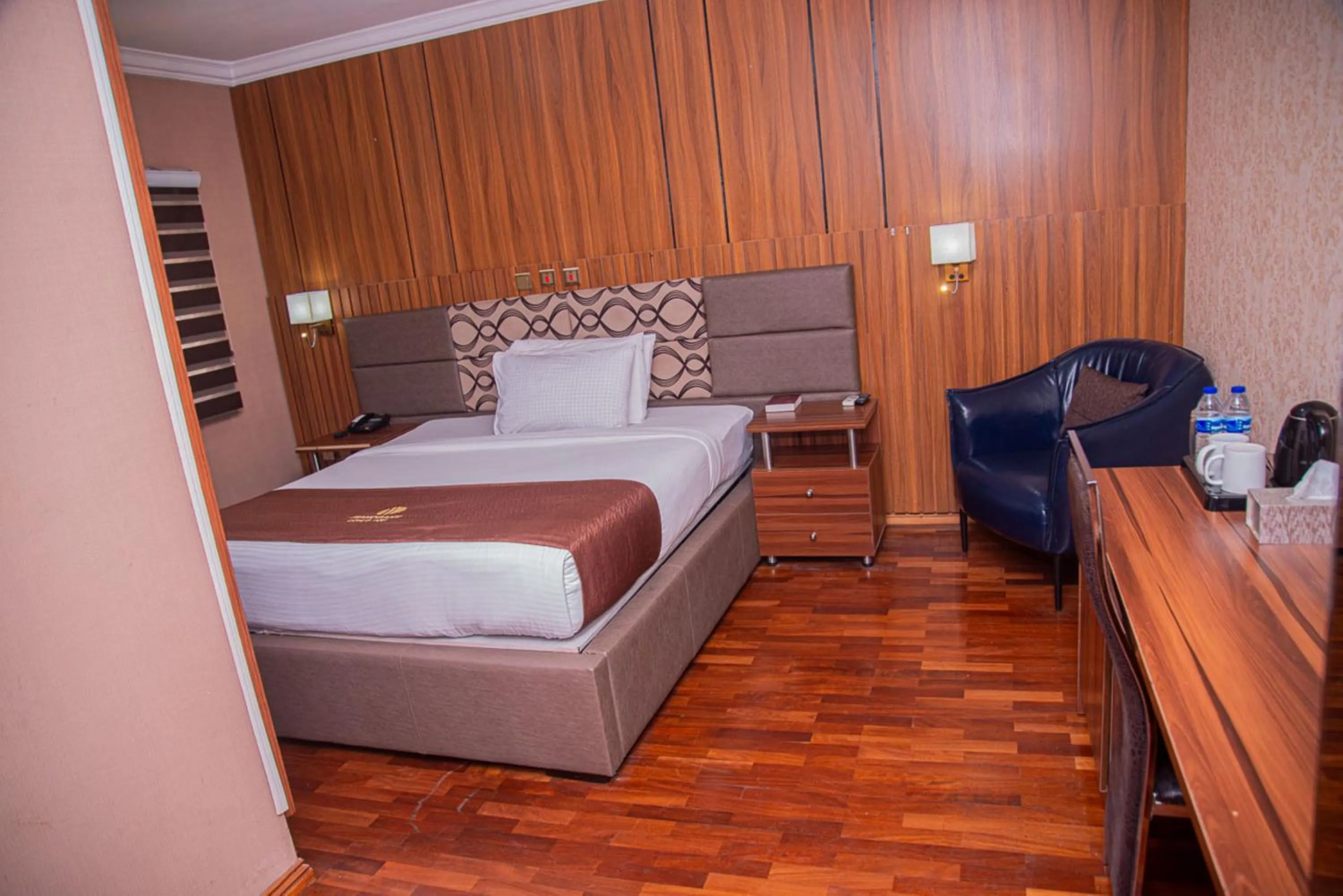 Bedroom in MAHOGANY HOTEL AND SUITES