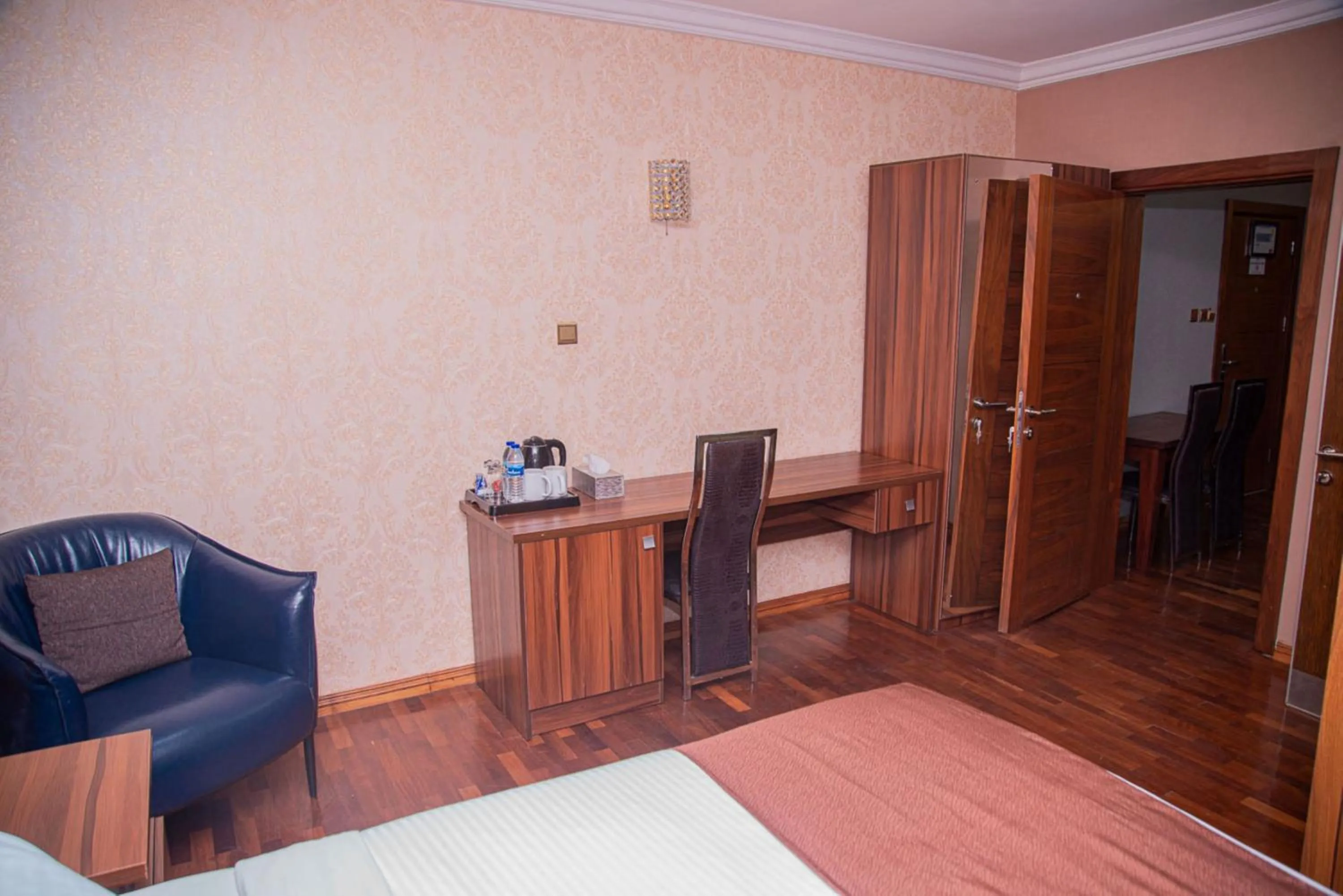 Bedroom in MAHOGANY HOTEL AND SUITES