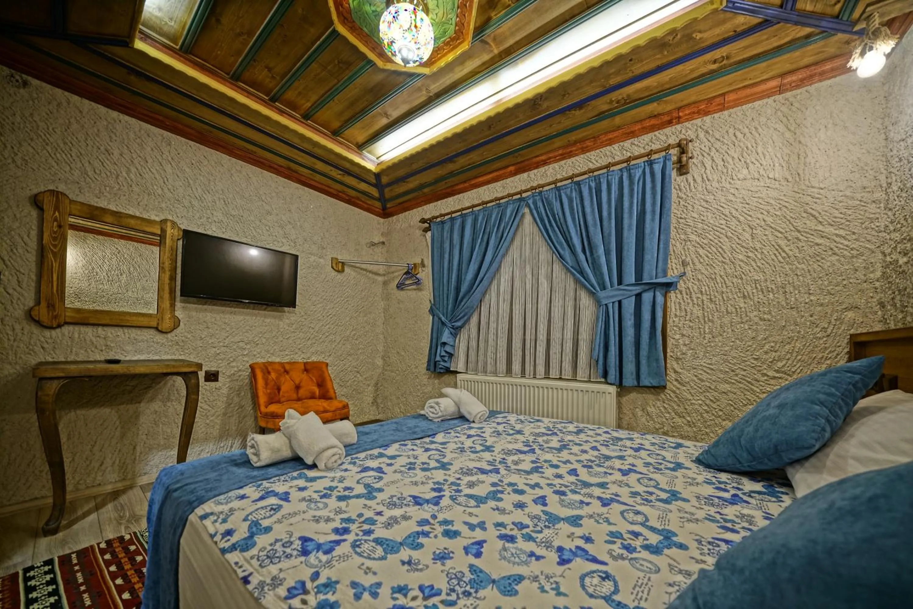 Bed in Cappa Cave Hotel