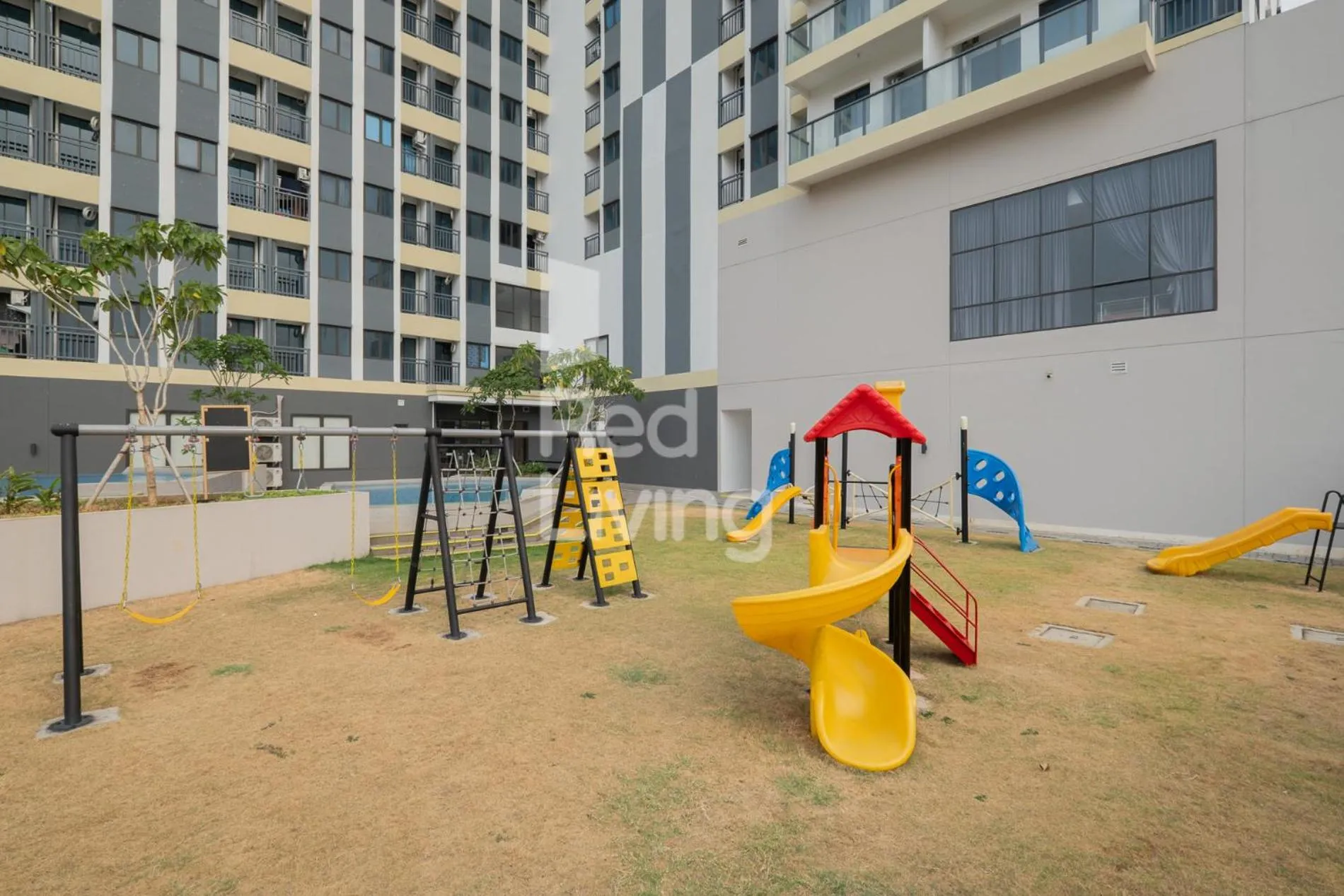 Children play ground in RedLiving Apartemen Jakarta Living Star - BoboRooms
