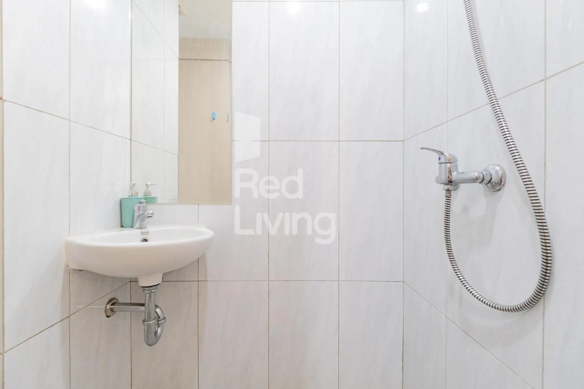 Bathroom in RedLiving Apartemen Jakarta Living Star - BoboRooms