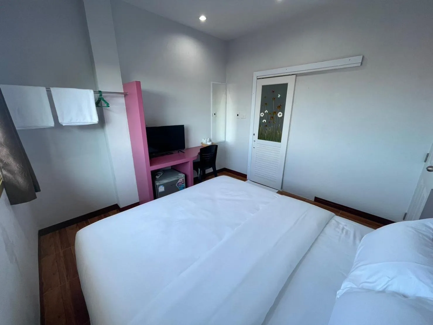 Bed in Chiang Kham Ruk Khun Hotel