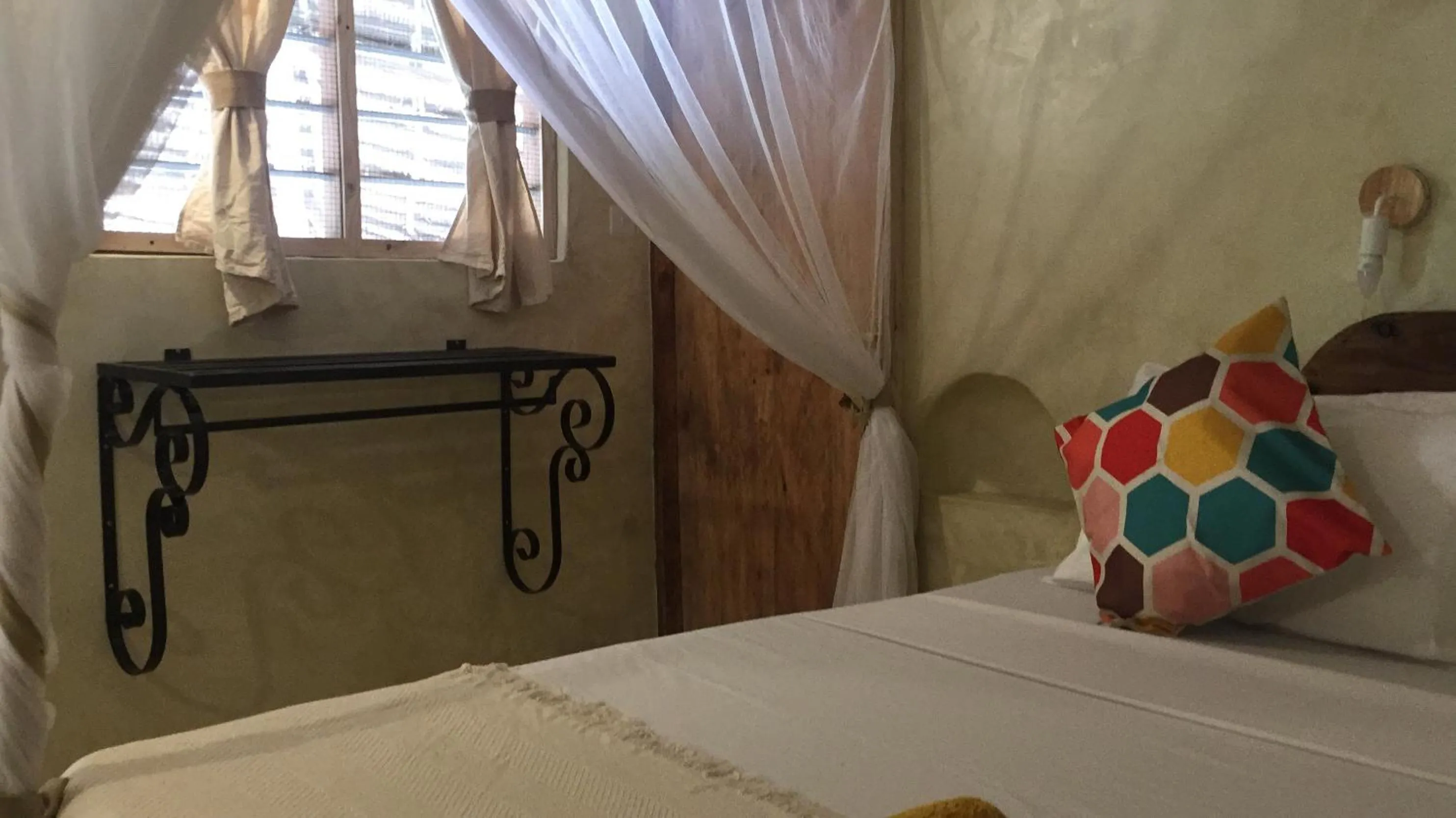 Photo of the whole room, Bed in Bahari Beach Bungalows