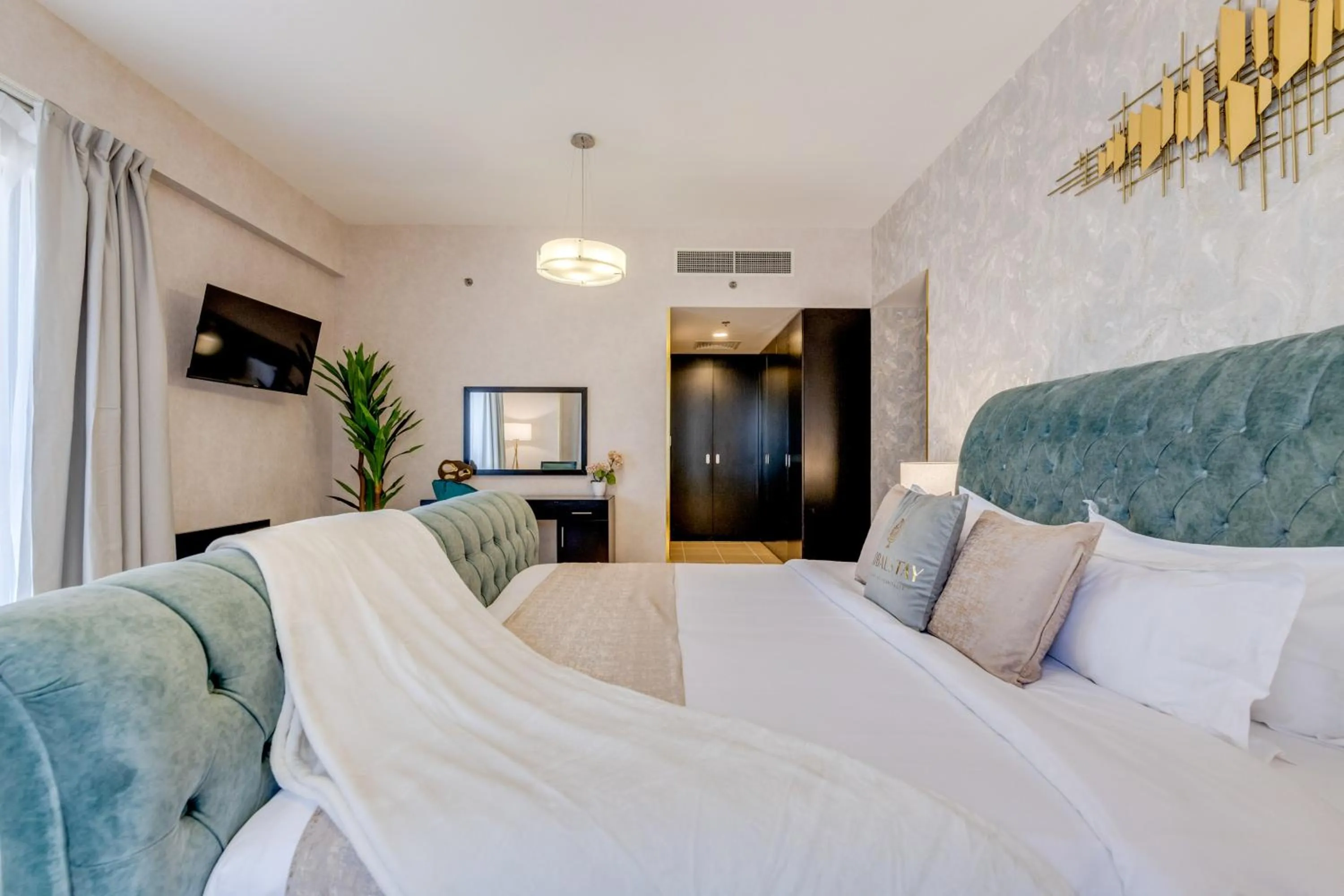 Bed in GLOBALSTAY. Modern Apartments steps to JBR Beach