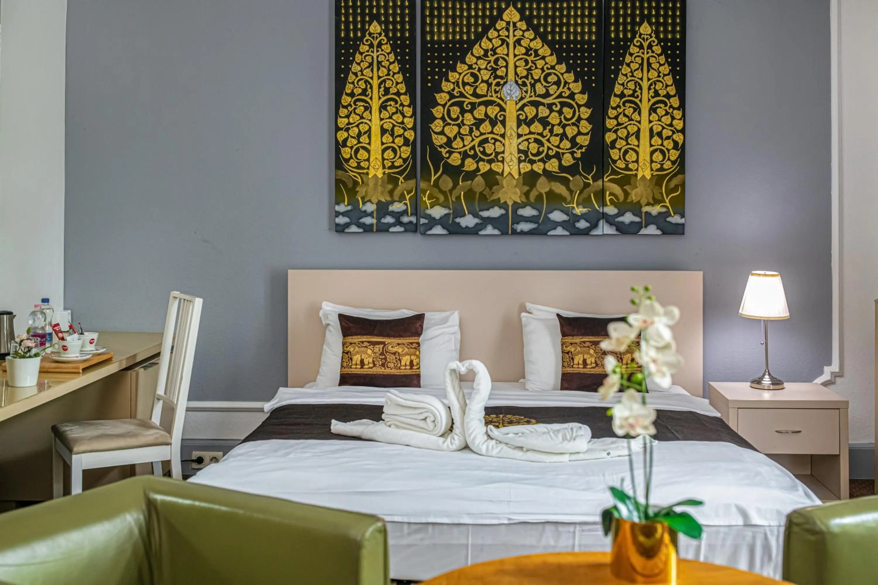 Bed in Andrassy Thai Hotel