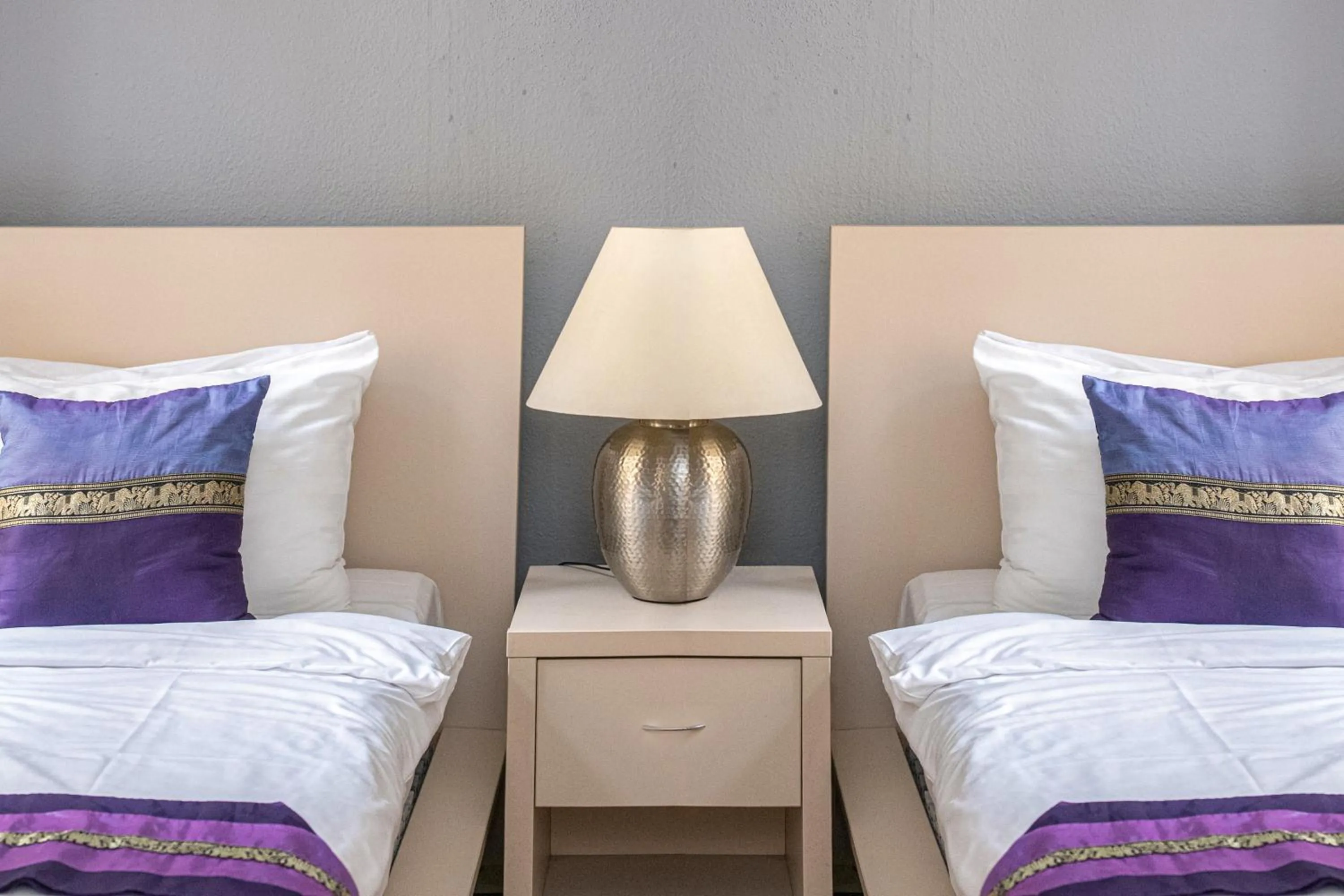 Bed in Andrassy Thai Hotel