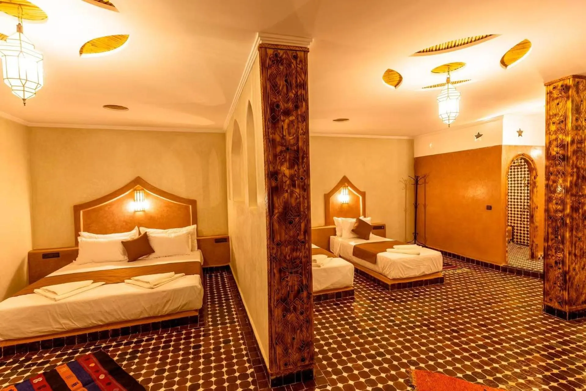 Bed in Hotel Sunset Palace