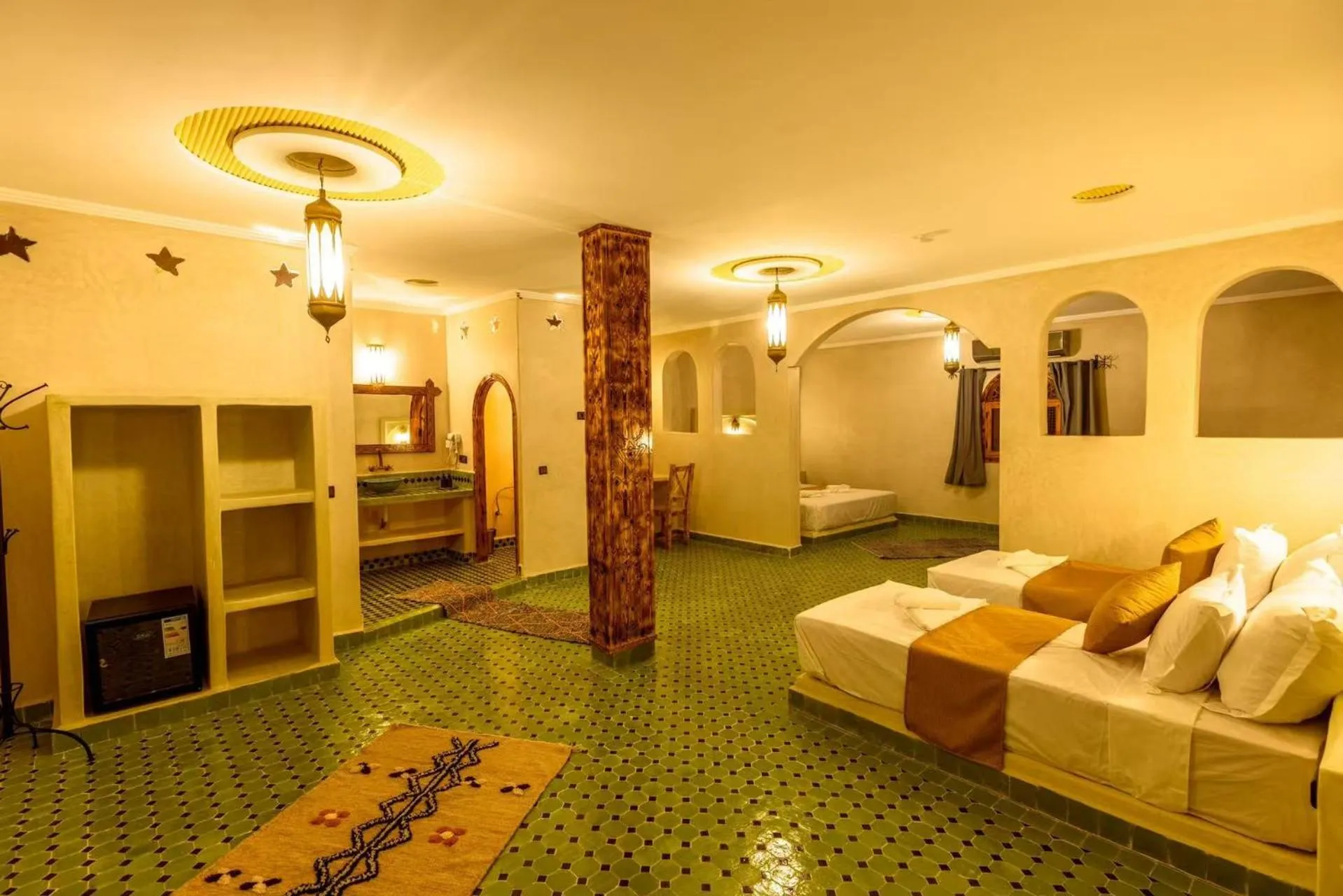 Bed in Hotel Sunset Palace