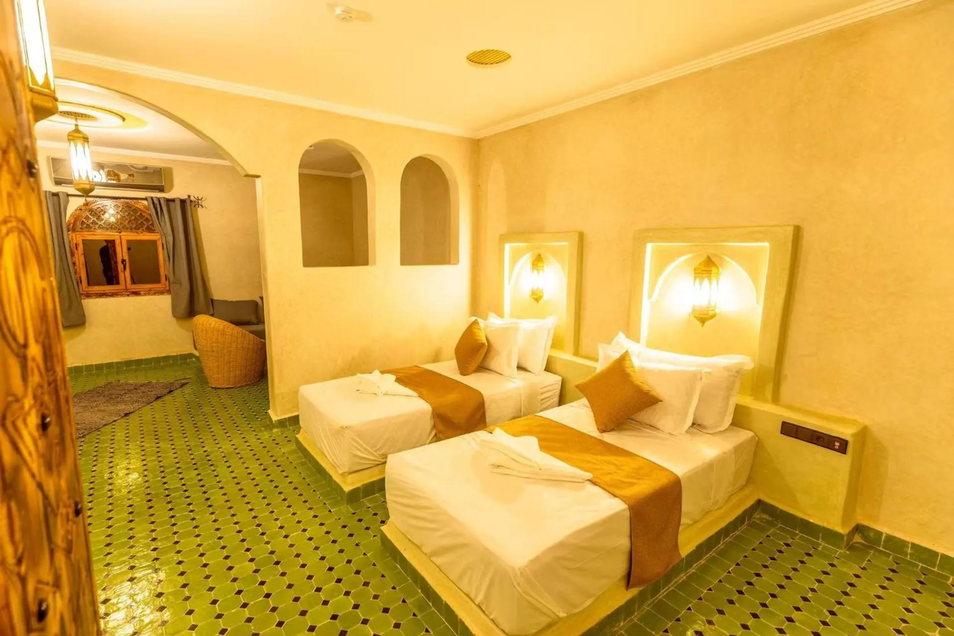 Bed in Hotel Sunset Palace