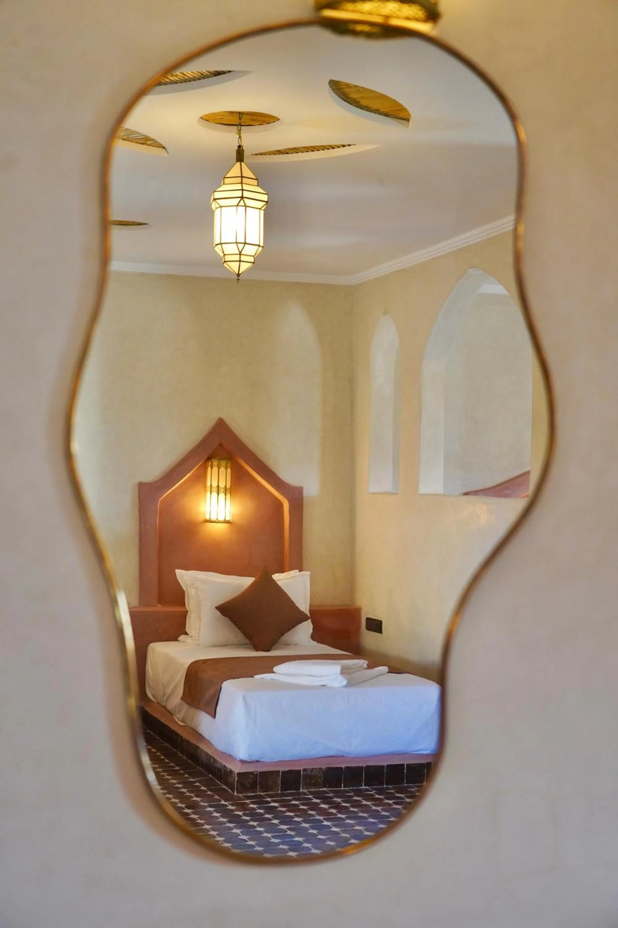 Bed in Hotel Sunset Palace