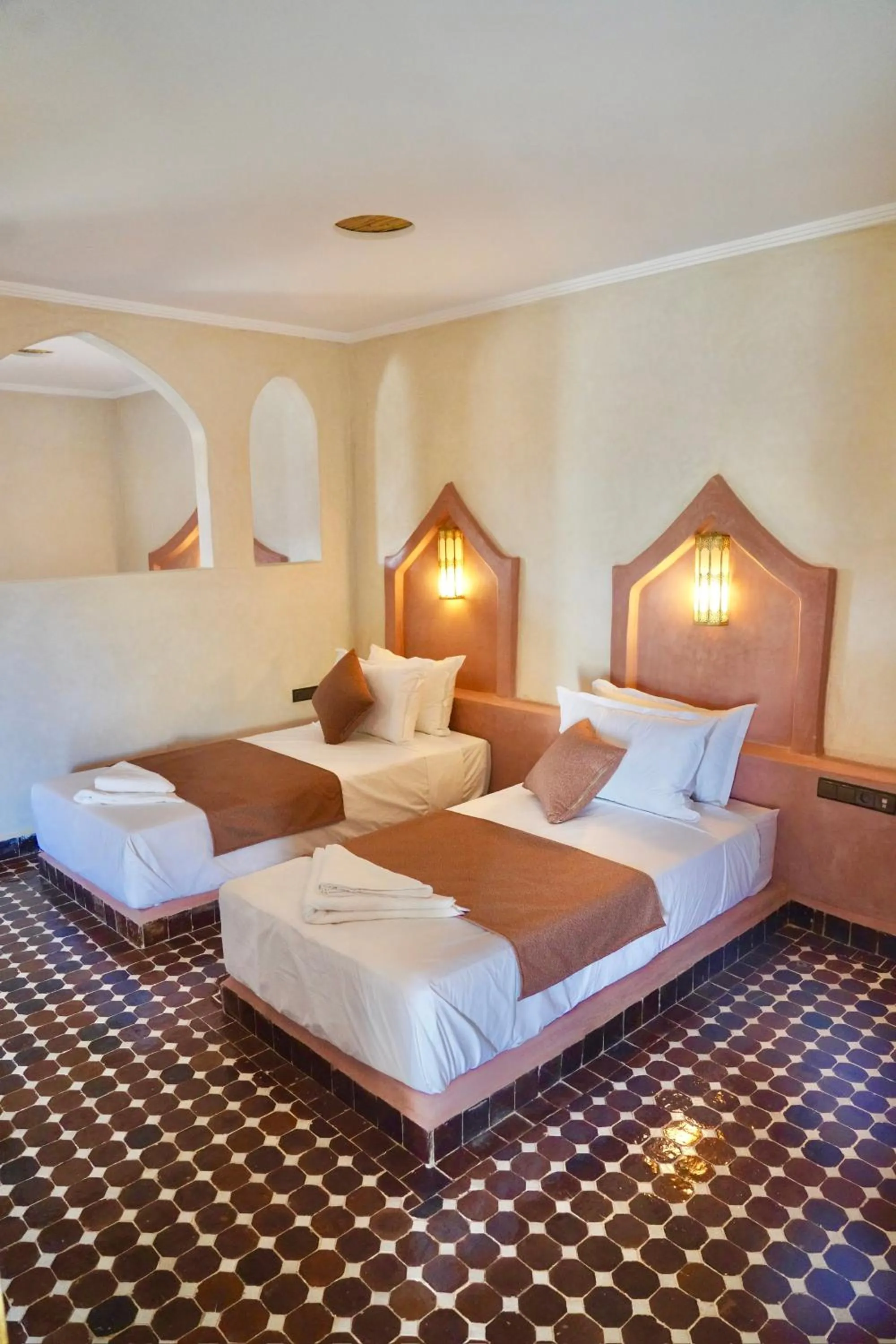 Bed in Hotel Sunset Palace