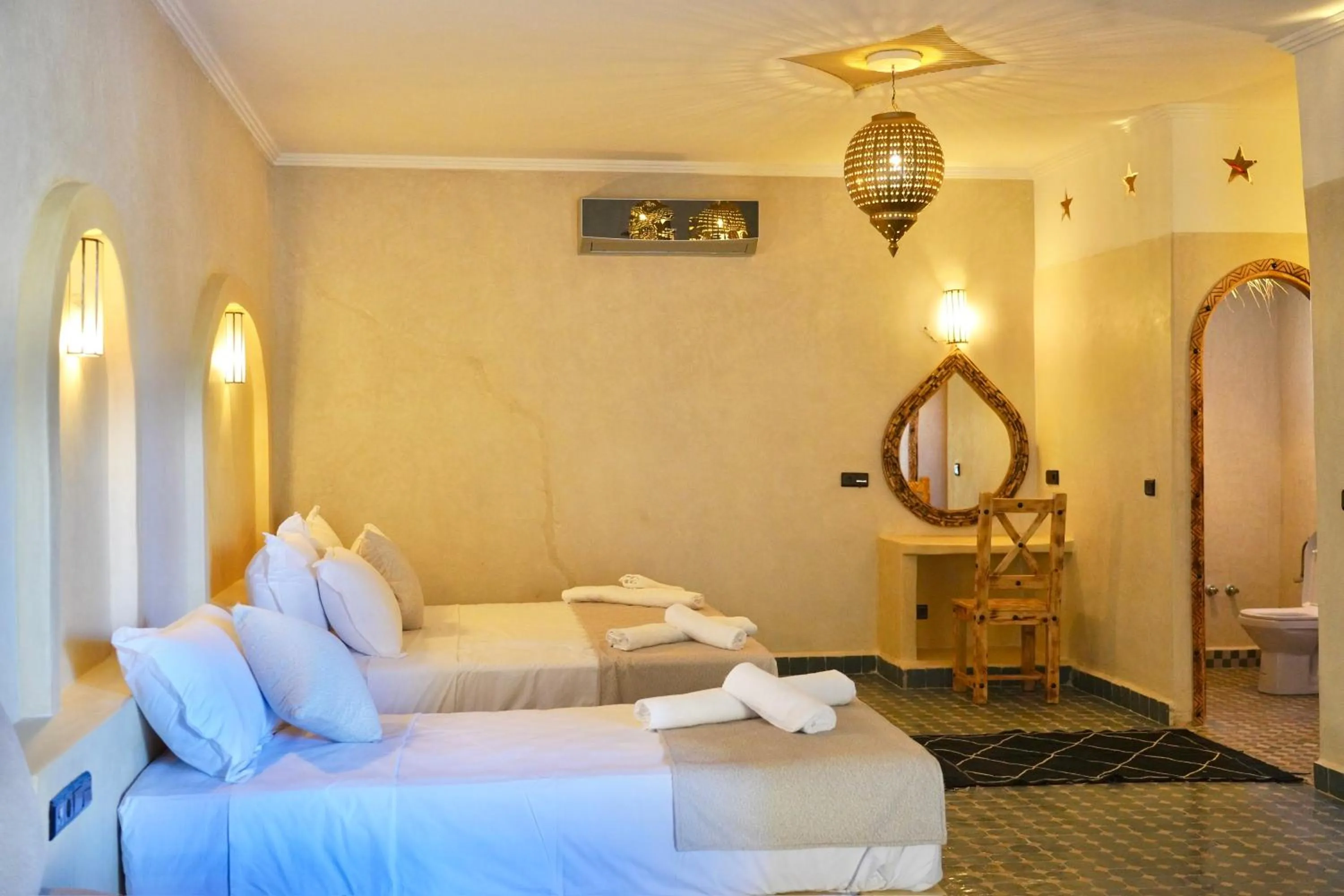 Bed in Hotel Sunset Palace