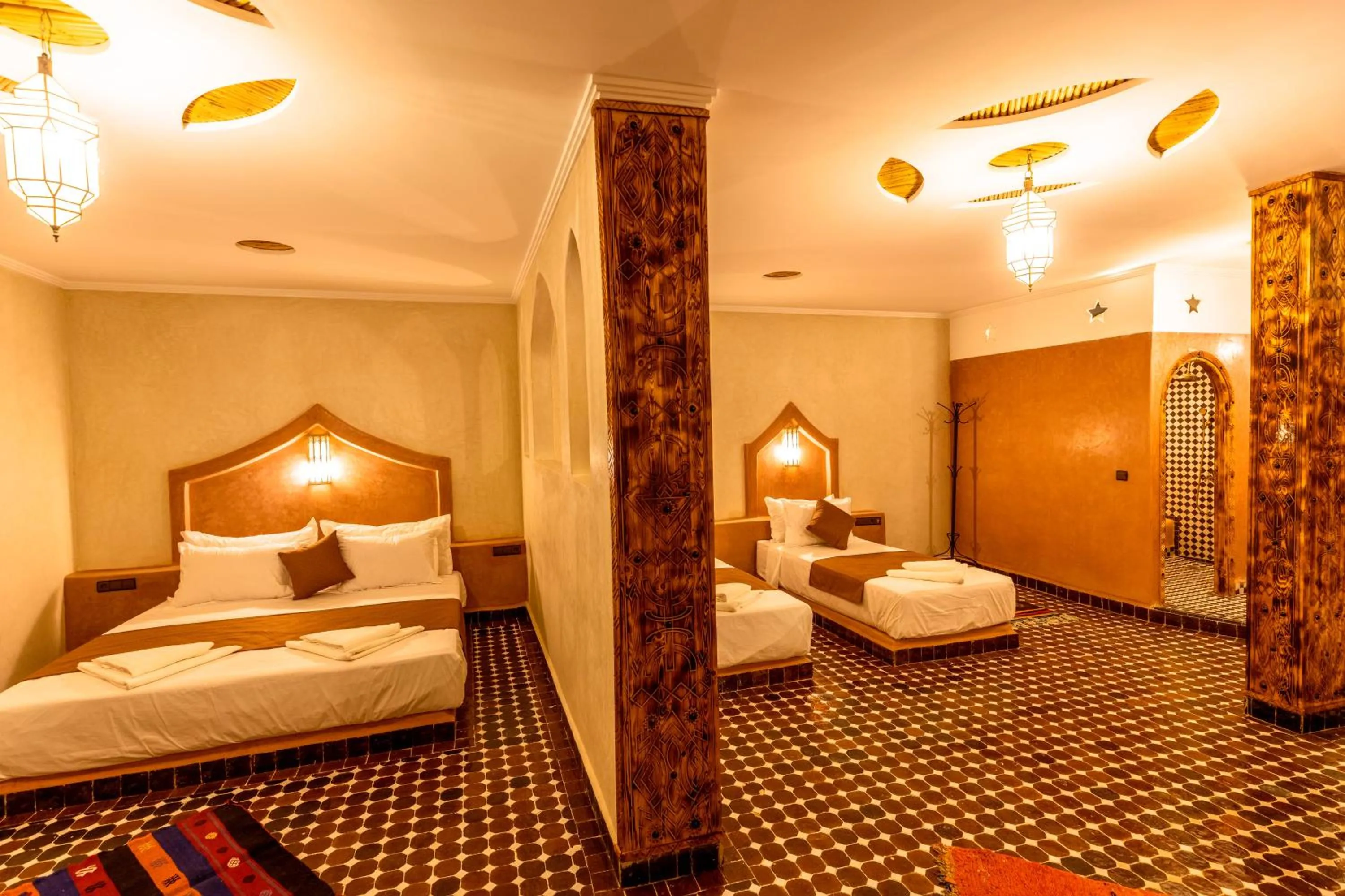 Bed in Hotel Sunset Palace