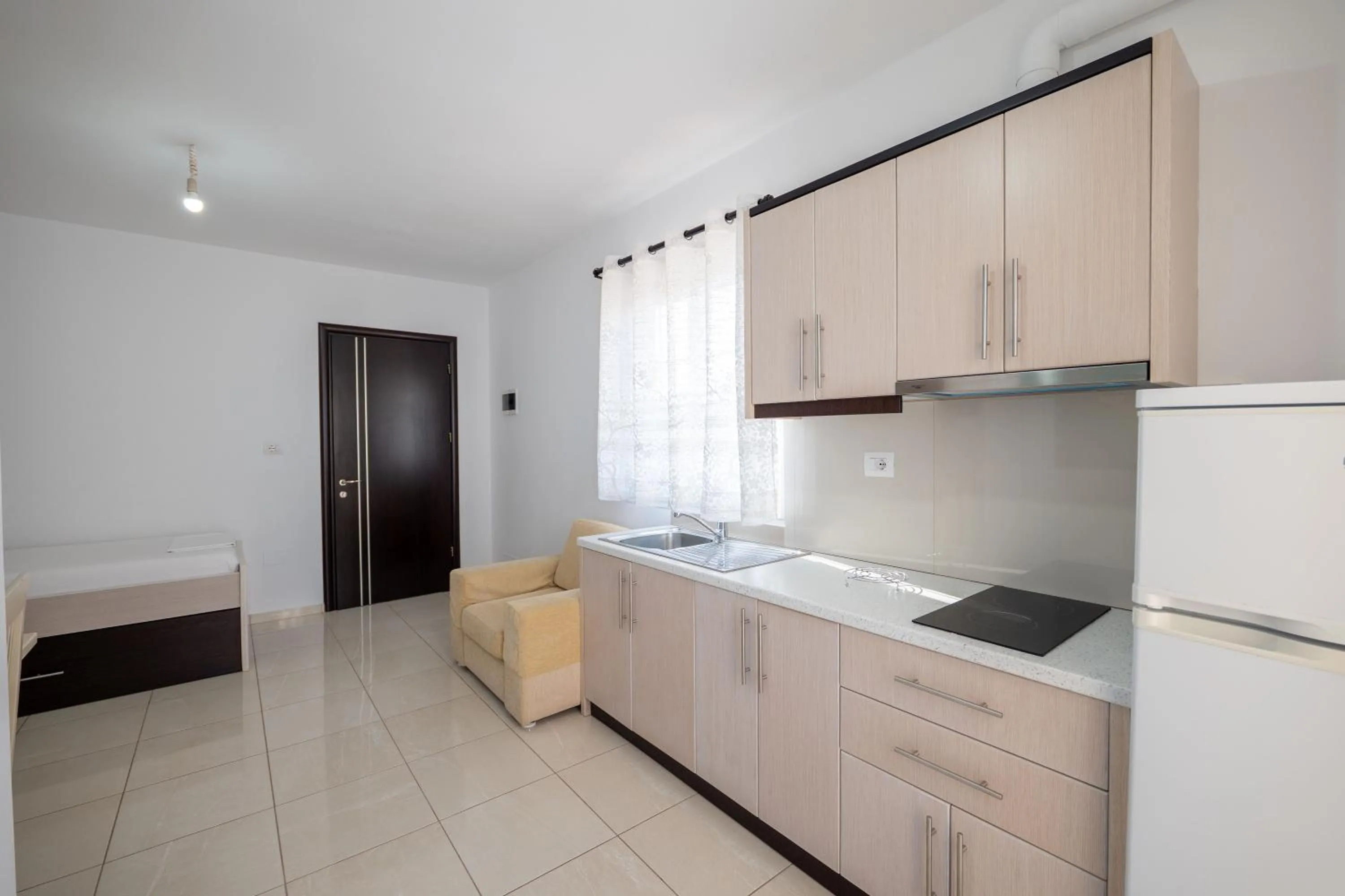 Kitchen or kitchenette in Apartments Aktea